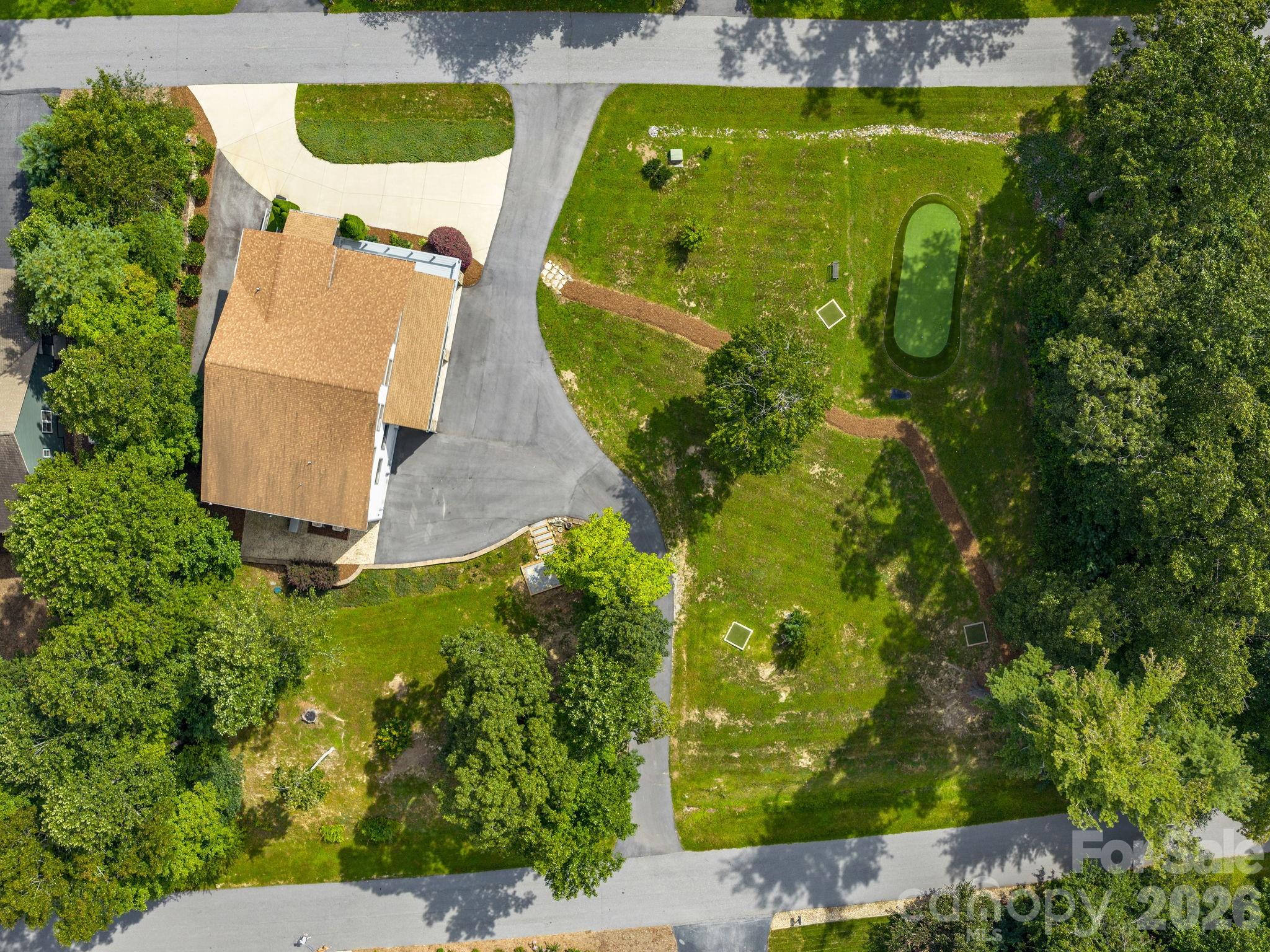 248 Wisdom Cove Road Flat Rock, NC 28731 - Photo 48 of 48 an aerial view of a swimming pool
