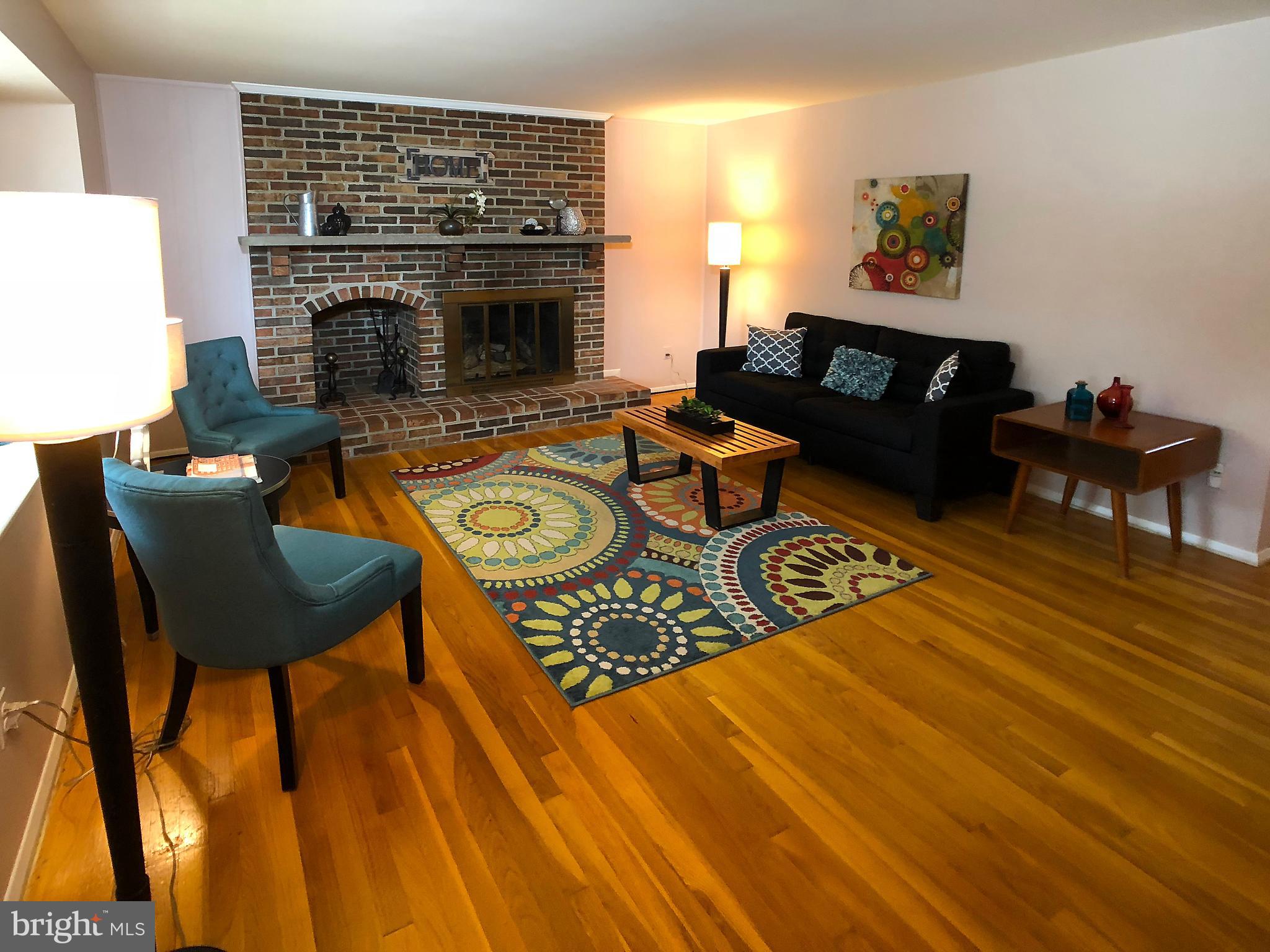 14 Flanders Ridge Court Cockeysville, MD 21030 - Photo 3 of 29 Gorgeous original floors & brick fireplace/mantel