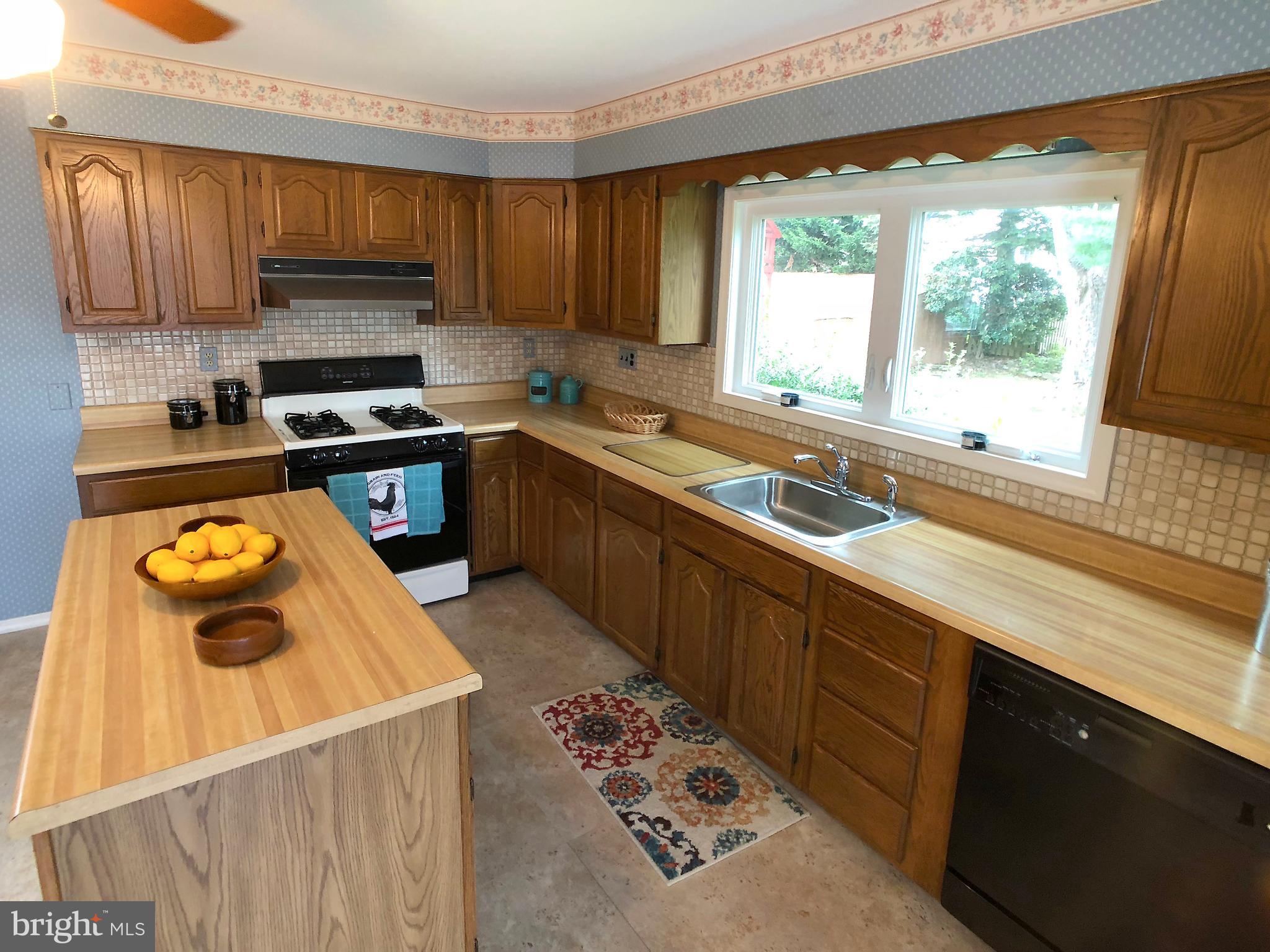14 Flanders Ridge Court Cockeysville, MD 21030 - Photo 10 of 29 Plenty of cabinets + an island and huge windows!