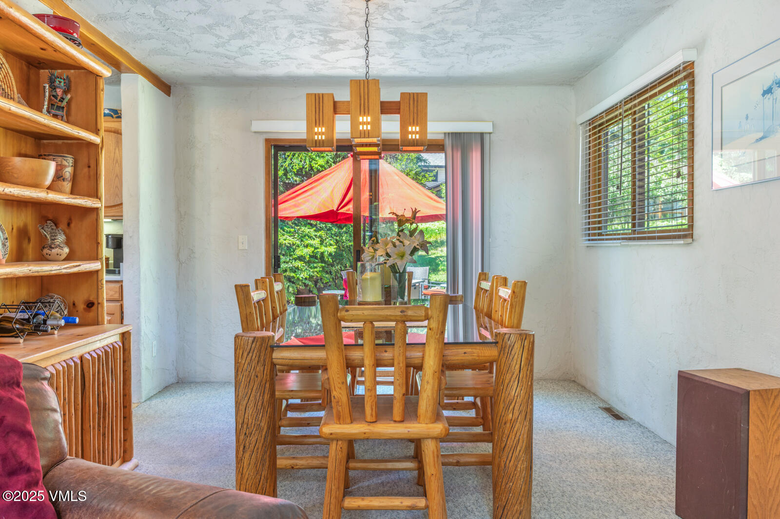 20 Hereford Road Edwards, CO 81632 - Photo 4 of 32 a dining room with furniture a chandelier and window