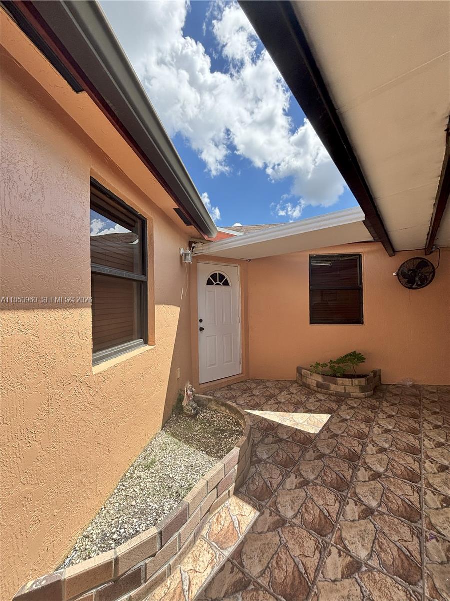 18601 Southwest 98th Avenue Cutler Bay, FL 33157 - Photo 20 of 28 a view of a back yard of the house