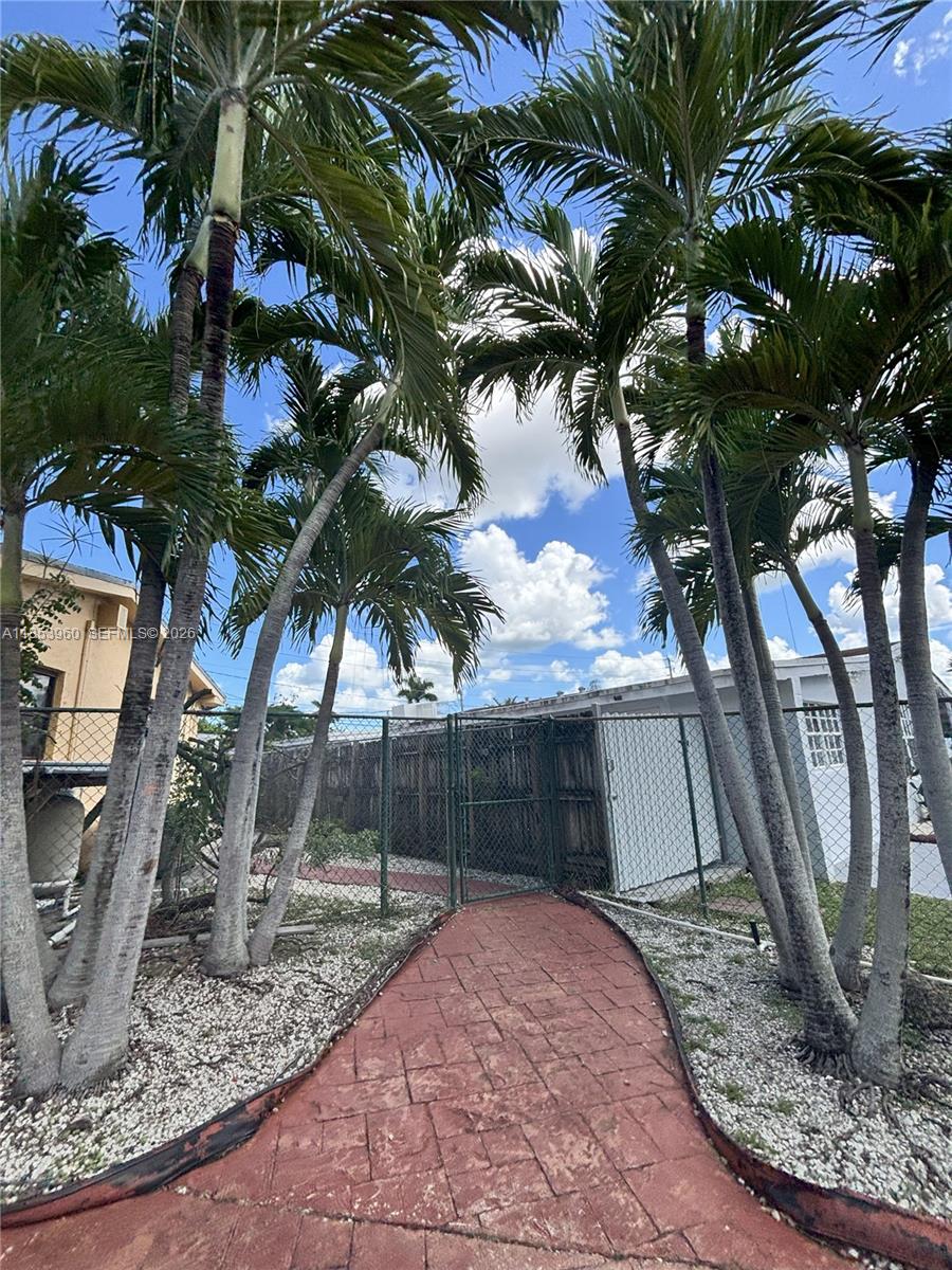 18601 Southwest 98th Avenue Cutler Bay, FL 33157 - Photo 2 of 28 a view of a yard with a tree