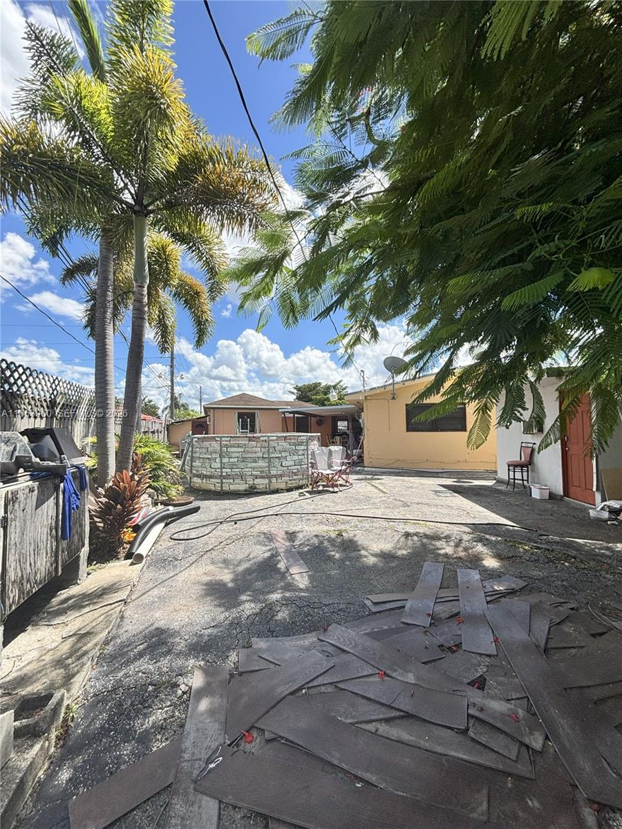 18601 Southwest 98th Avenue Cutler Bay, FL 33157 - Photo 24 of 28 a view of a yard with a tree