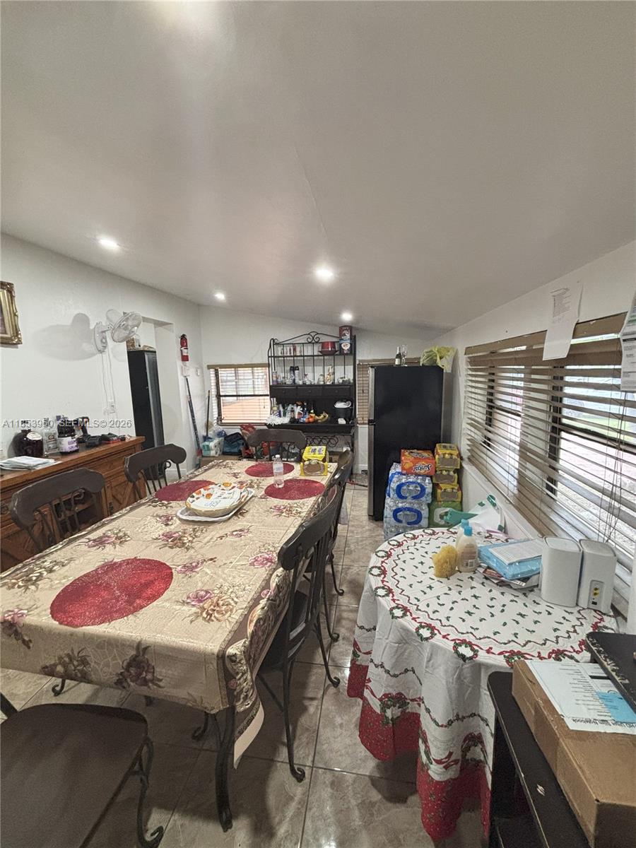 18601 Southwest 98th Avenue Cutler Bay, FL 33157 - Photo 9 of 28 a view of a dining room with furniture