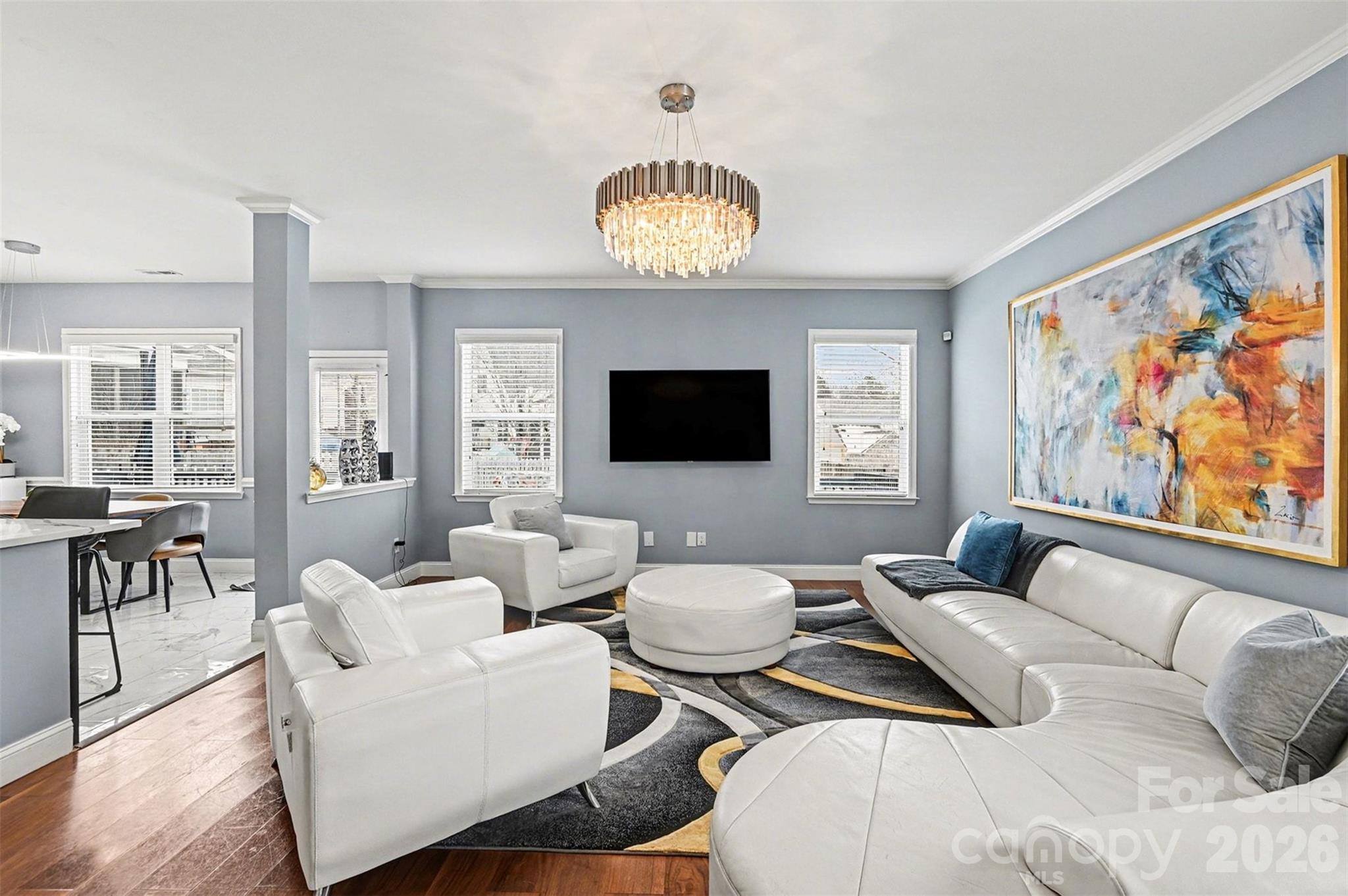 2213 Iron Works Drive Clover, SC 29710 - Photo 14 of 46 a living room with furniture a large window and a flat screen tv