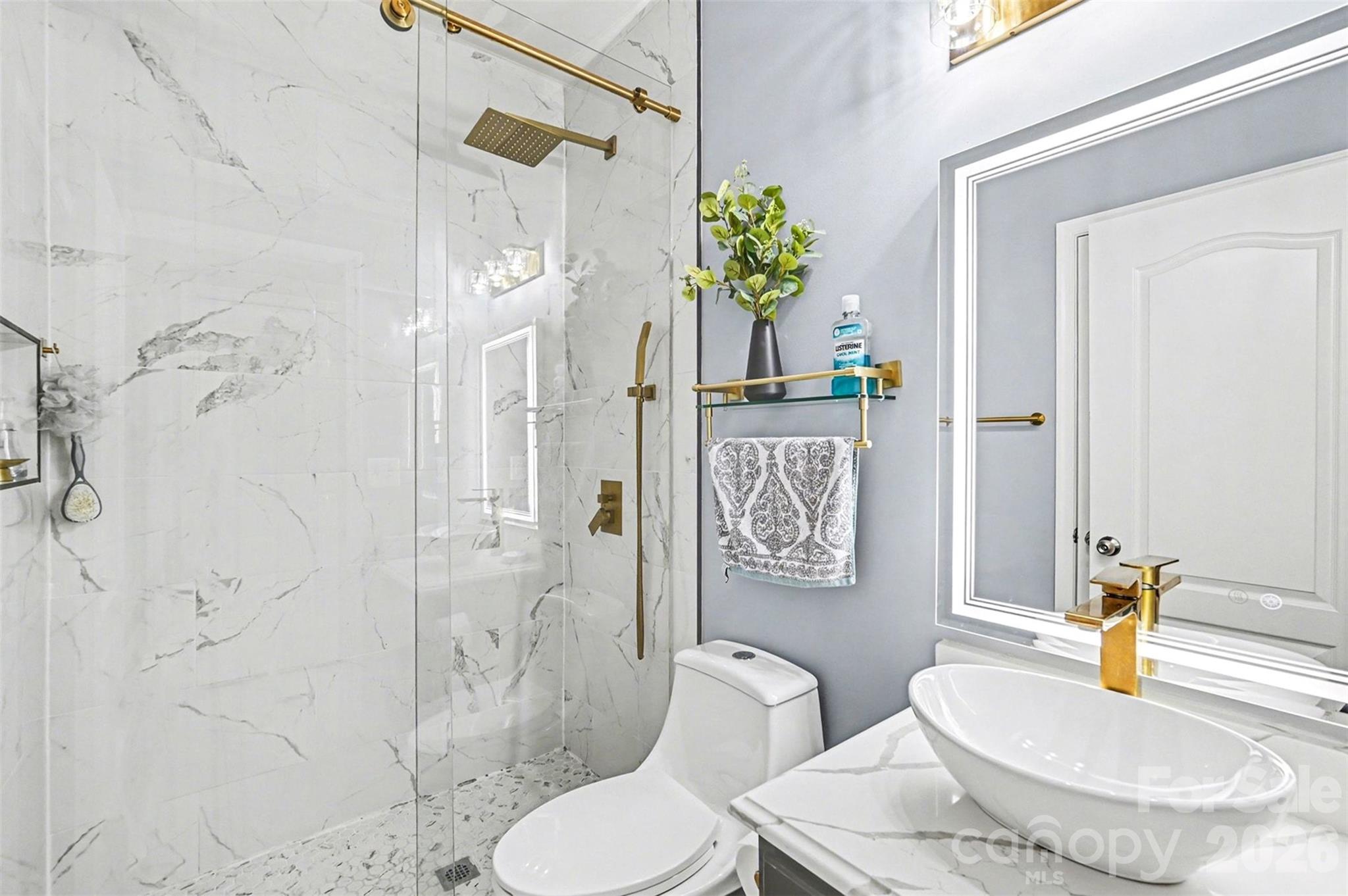 2213 Iron Works Drive Clover, SC 29710 - Photo 18 of 46 a bathroom with a sink toilet and shower