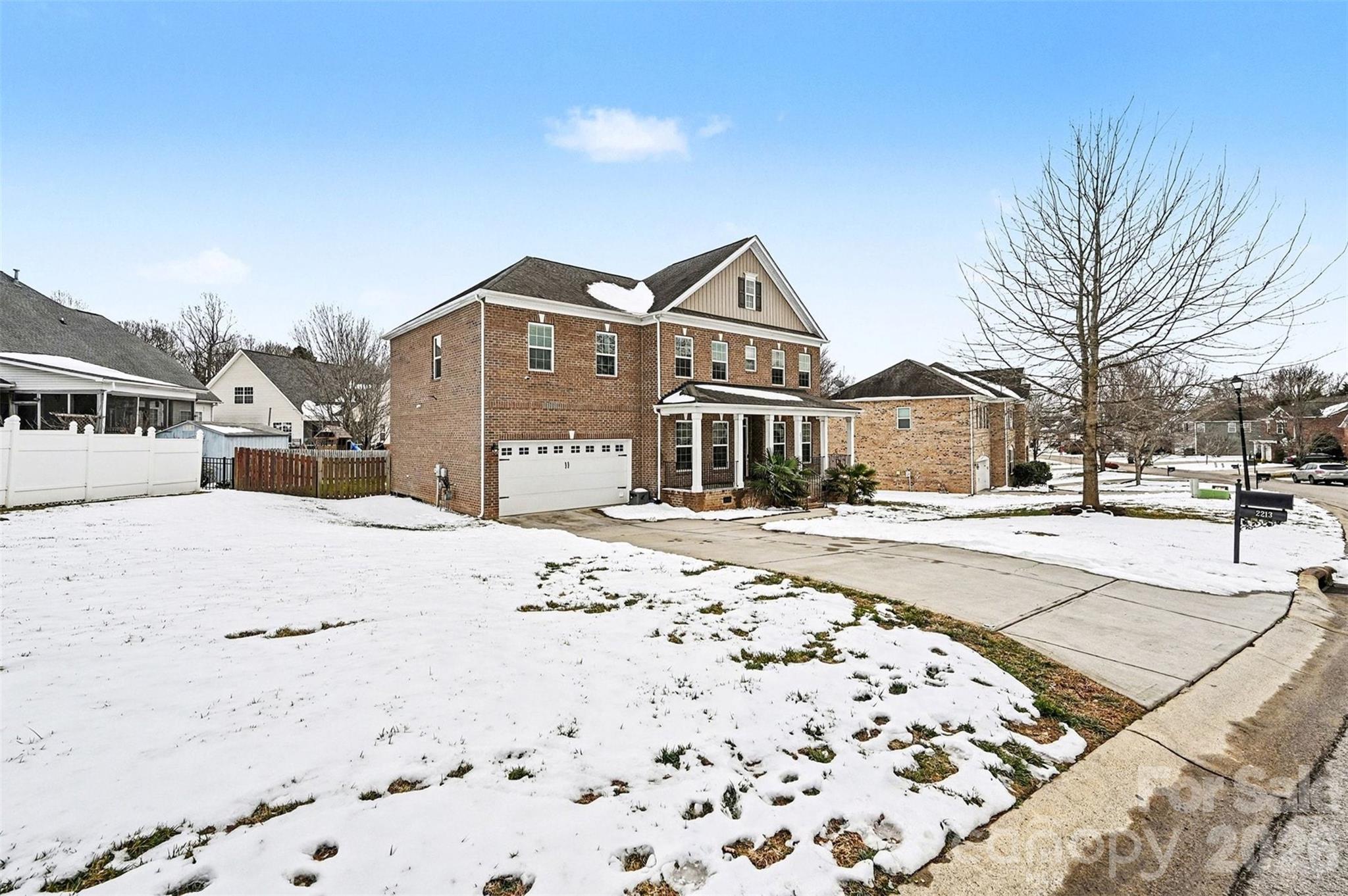 2213 Iron Works Drive Clover, SC 29710 - Photo 2 of 46 a front view of a house with a yard
