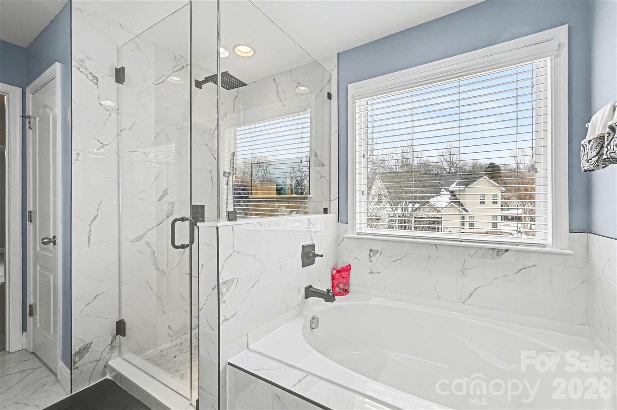 2213 Iron Works Drive Clover, SC 29710 - Photo 25 of 46 a white bath tub sitting next to a shower