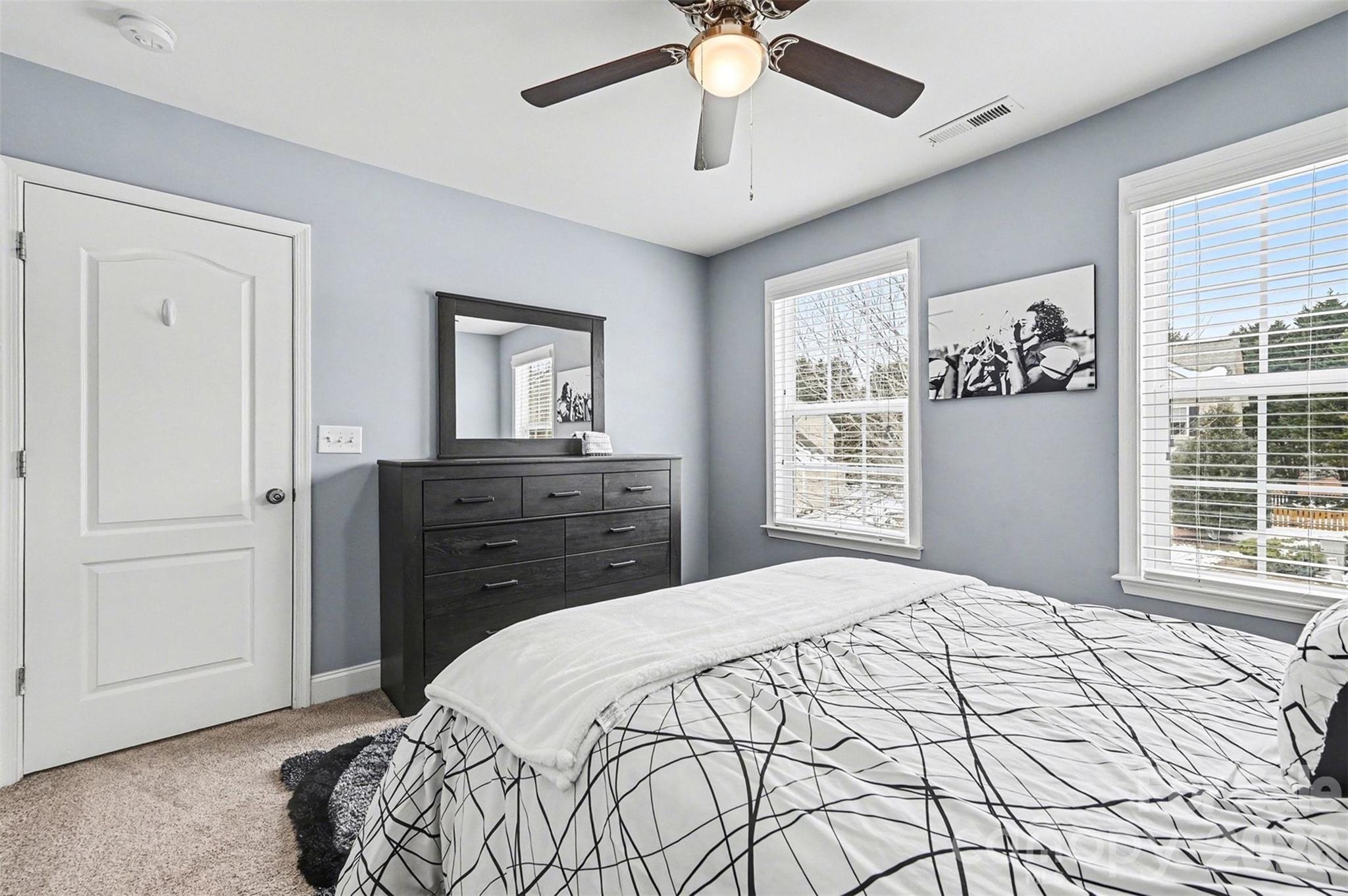 2213 Iron Works Drive Clover, SC 29710 - Photo 30 of 46 a bedroom with a large bed and a window