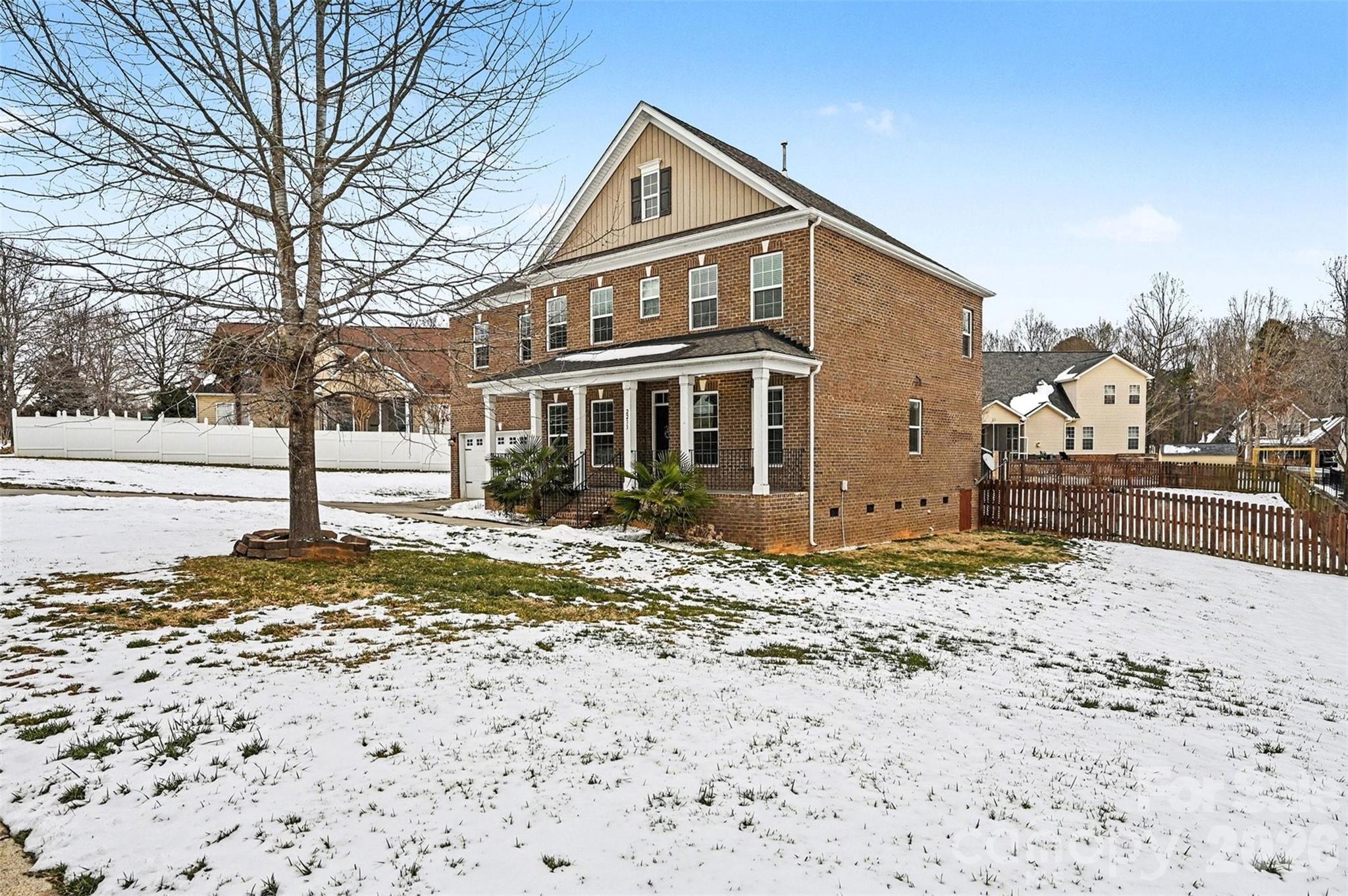 2213 Iron Works Drive Clover, SC 29710 - Photo 3 of 46 a front view of a house with a yard