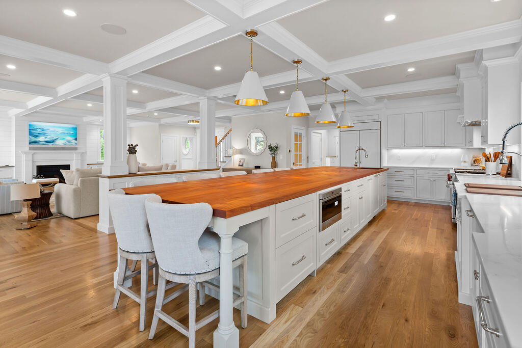64 Pershing Lane Orleans, MA 02653 - Photo 39 of 100 a large white kitchen with a large window