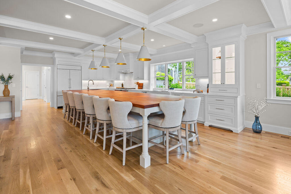 64 Pershing Lane Orleans, MA 02653 - Photo 40 of 100 a dining room with furniture window and wooden floor