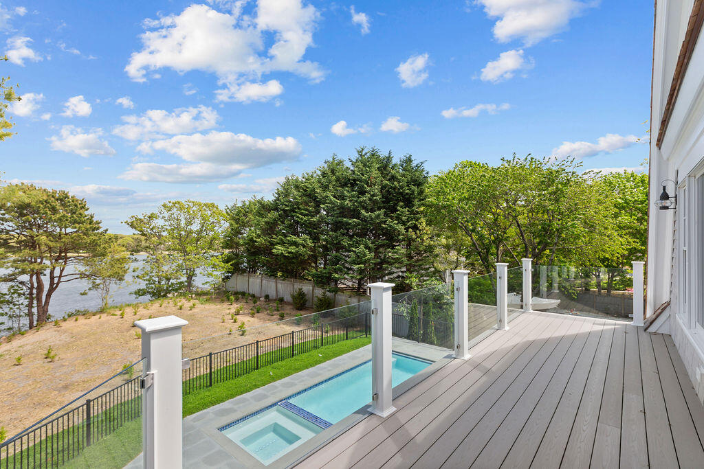 64 Pershing Lane Orleans, MA 02653 - Photo 58 of 100 a view of a pathway with a yard