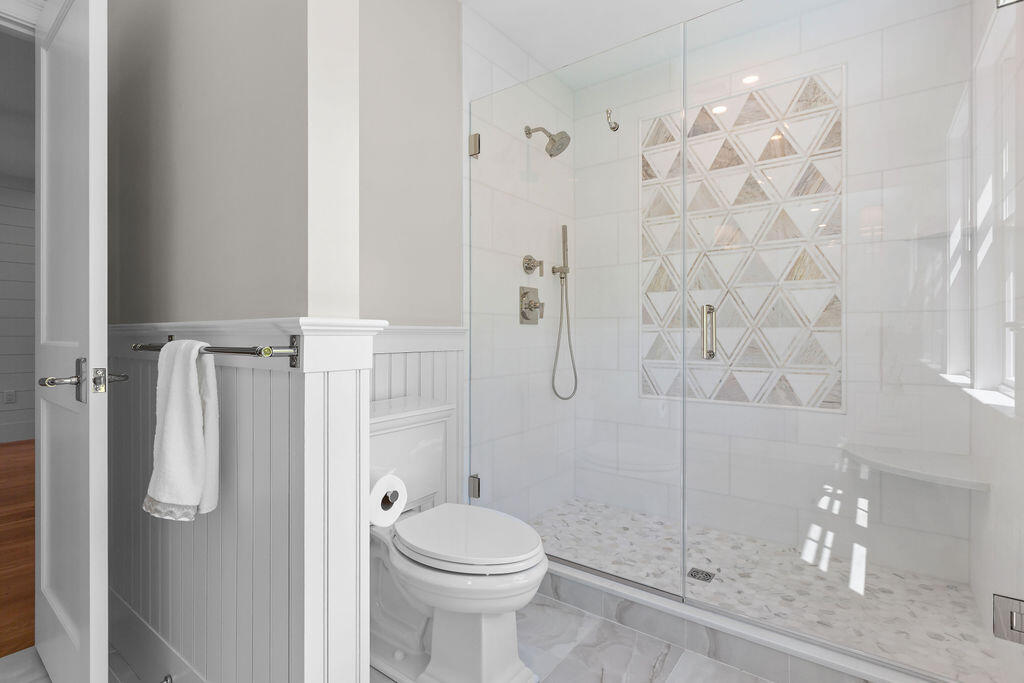 64 Pershing Lane Orleans, MA 02653 - Photo 83 of 100 a bathroom with a shower and toilet
