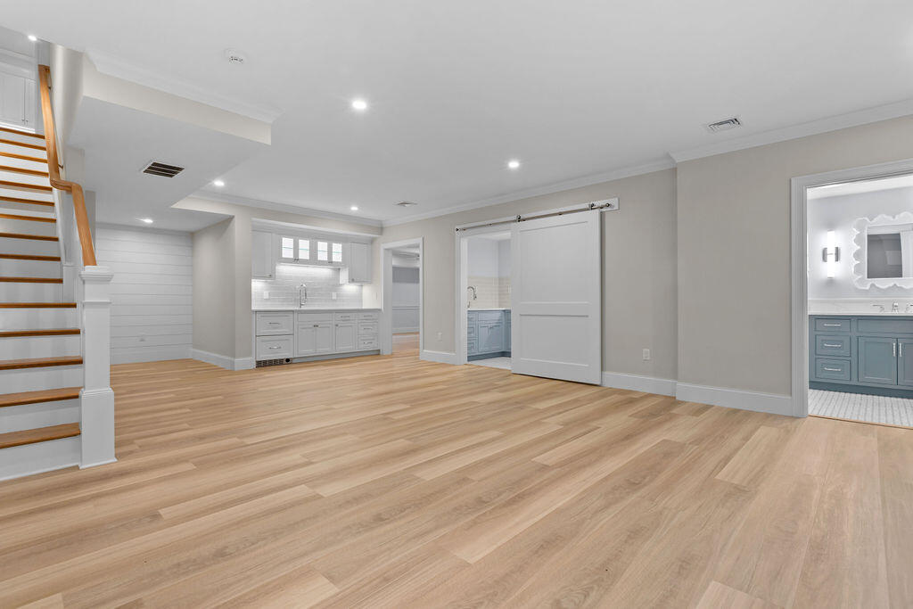 64 Pershing Lane Orleans, MA 02653 - Photo 86 of 100 a view of empty room with wooden floor