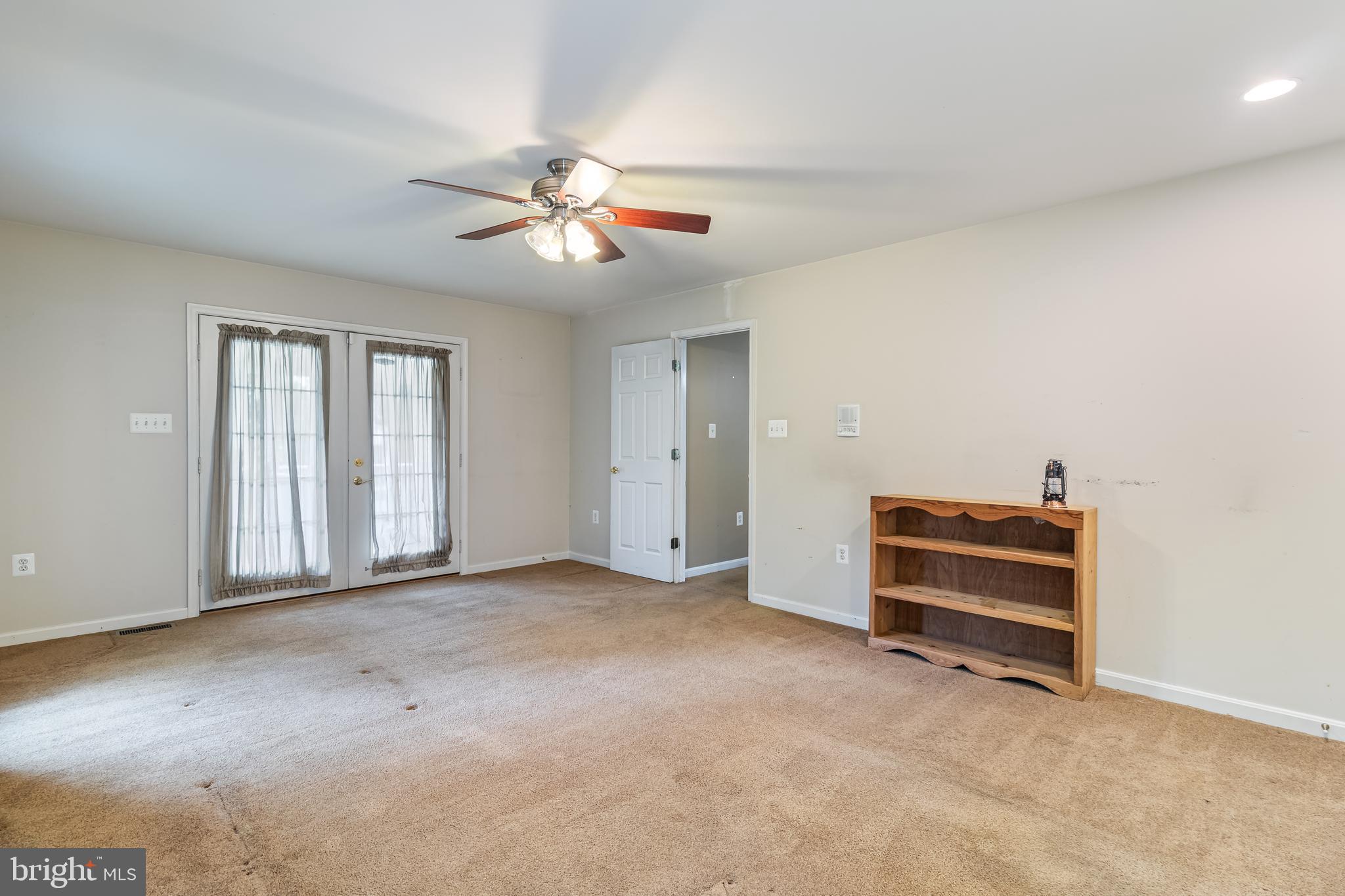203 Morgans Ridge Court La Plata, MD 20646 - Photo 29 of 59 an empty room with windows and fan