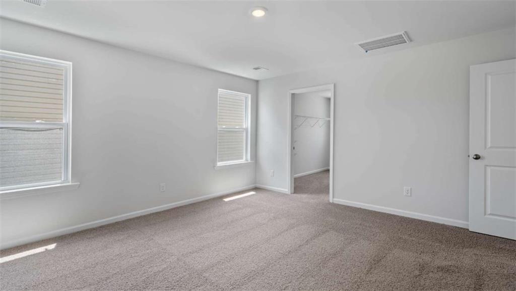 6062 Knickerbocker Street Mableton, GA 30126 - Photo 9 of 11 a view of an empty room with a window