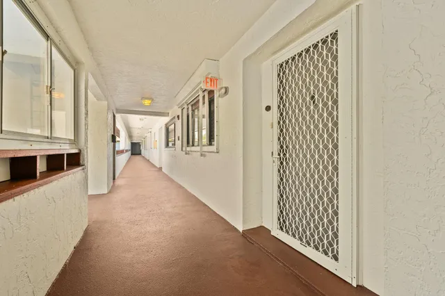 a room with cabinets and wooden floor