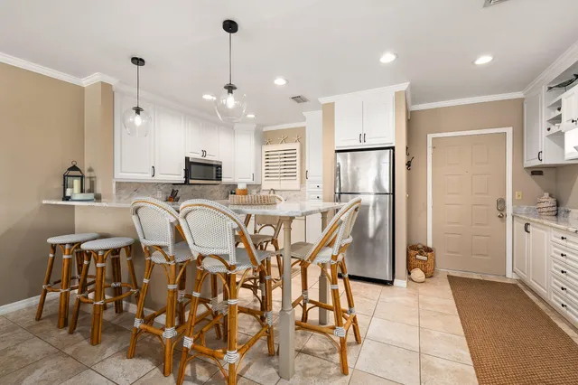 a view of a dining room with furniture