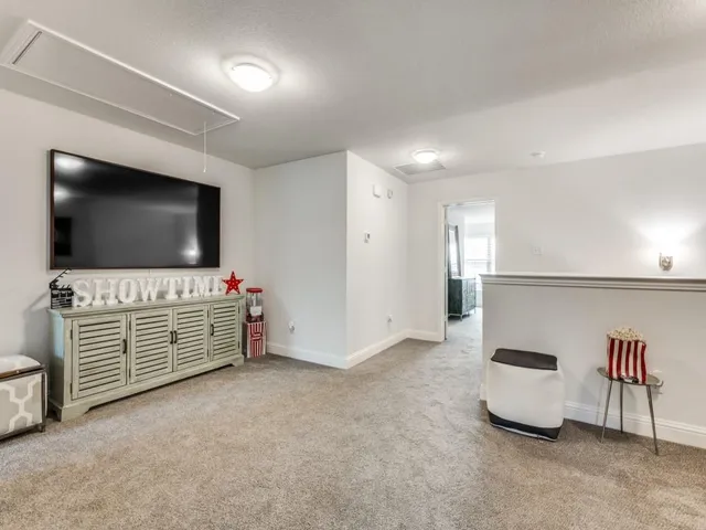 a view of storage and utility room with washer and dryer