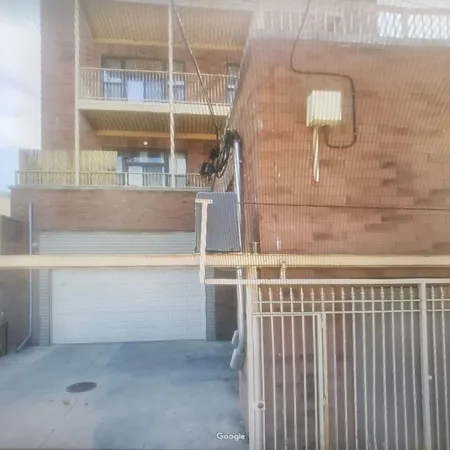 a view of a balcony with a door