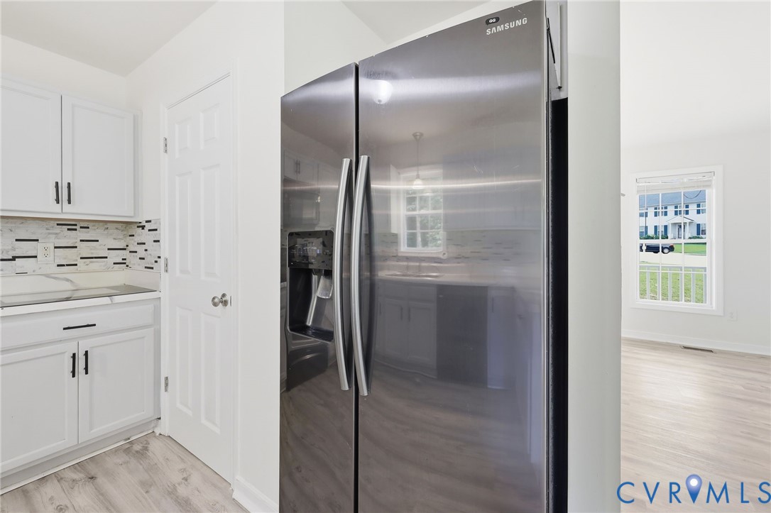 7610 Sugar Run Road Hopewell, VA 23860 - Photo 36 of 48 Stainless steel side-by-side refrigerator, white k