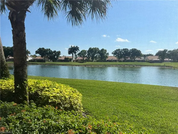 a view of a lake with a beach