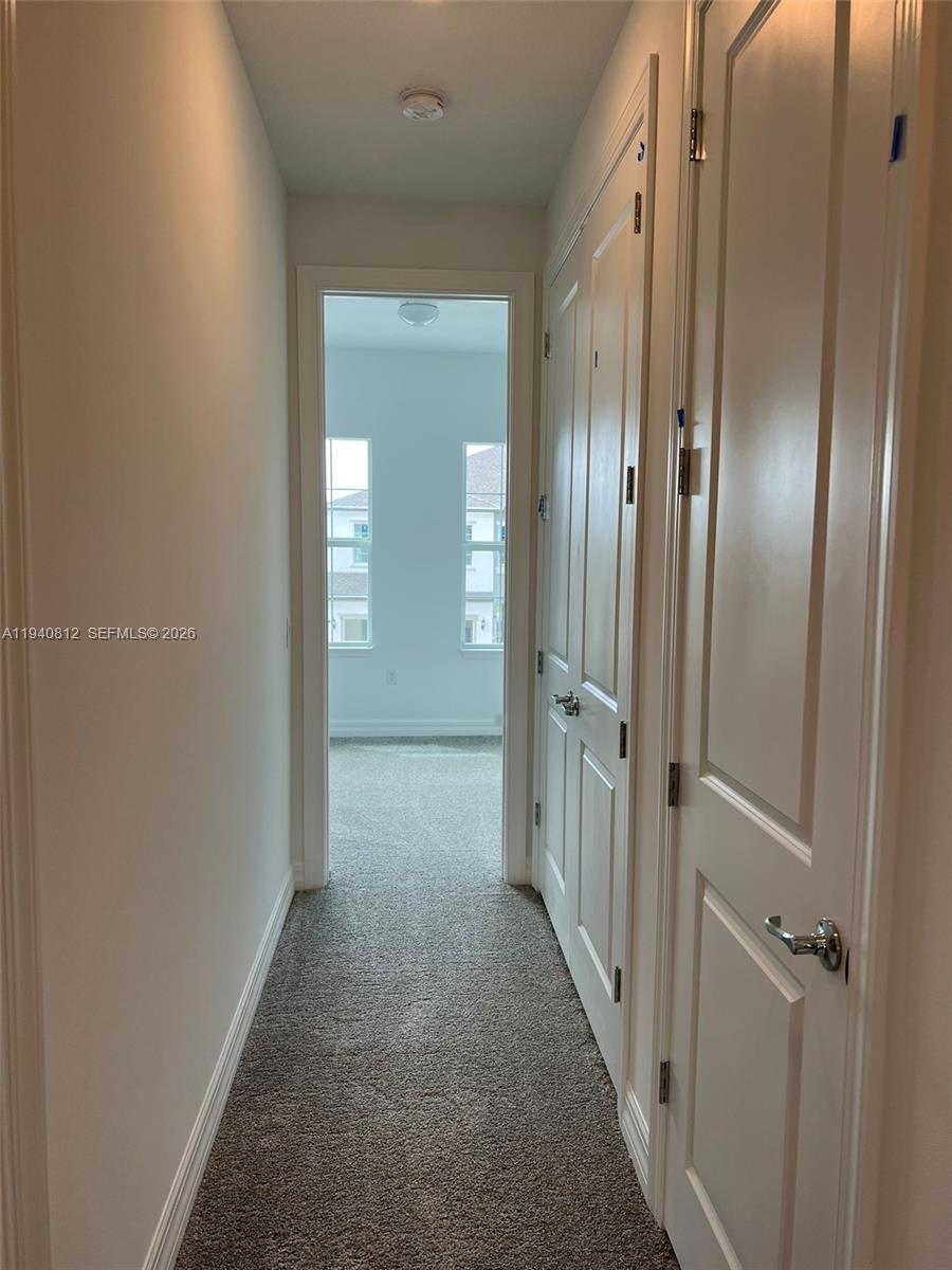 6121 Rancho Lane Greenacres, FL 33415 - Photo 11 of 17 a view of a hallway