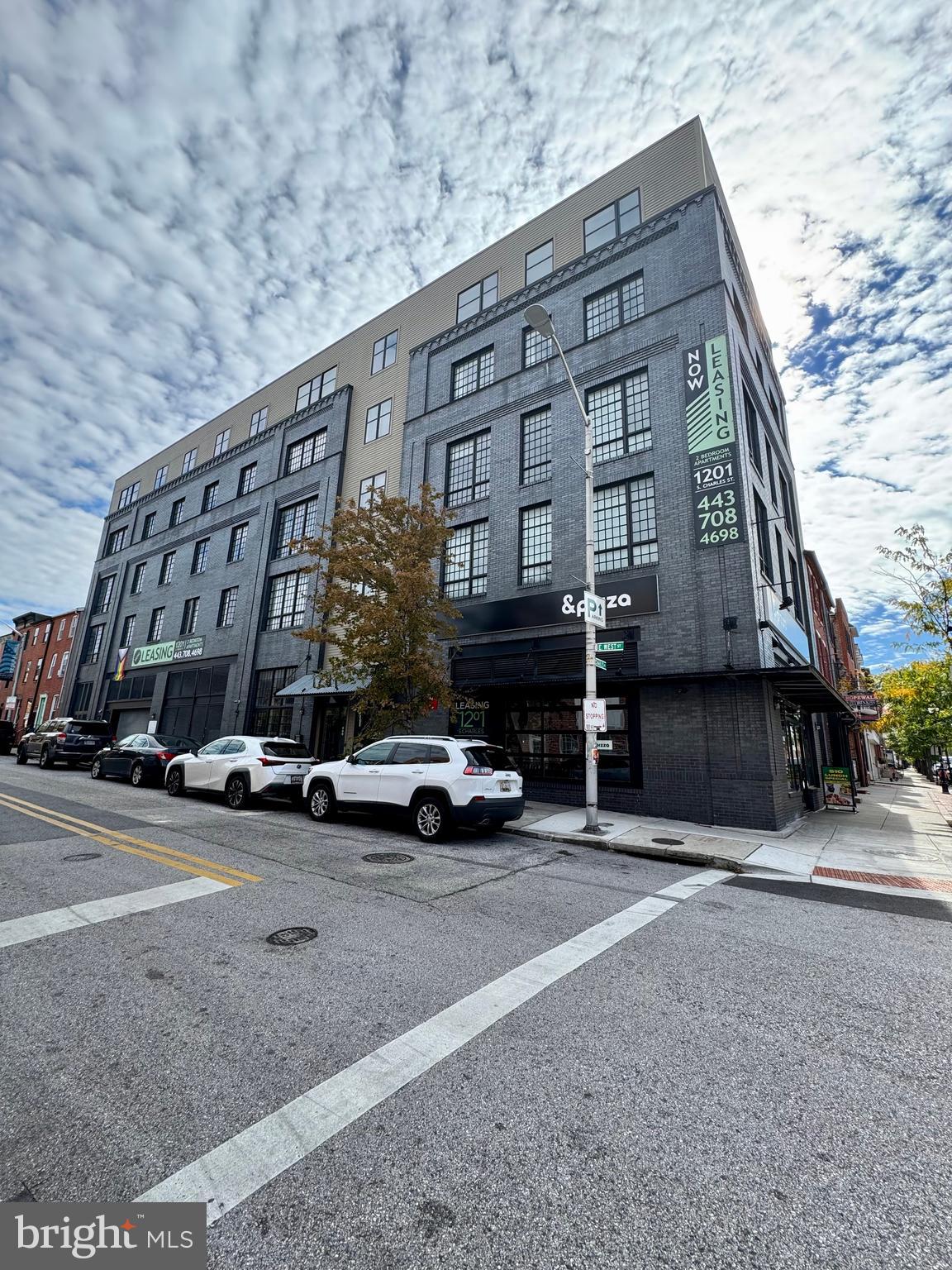1201 South Charles Street, Unit 5A Baltimore, MD 21230 - Photo 15 of 15 a car parked in front of a building