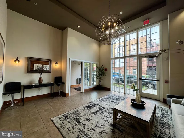 a view of a livingroom with furniture and window