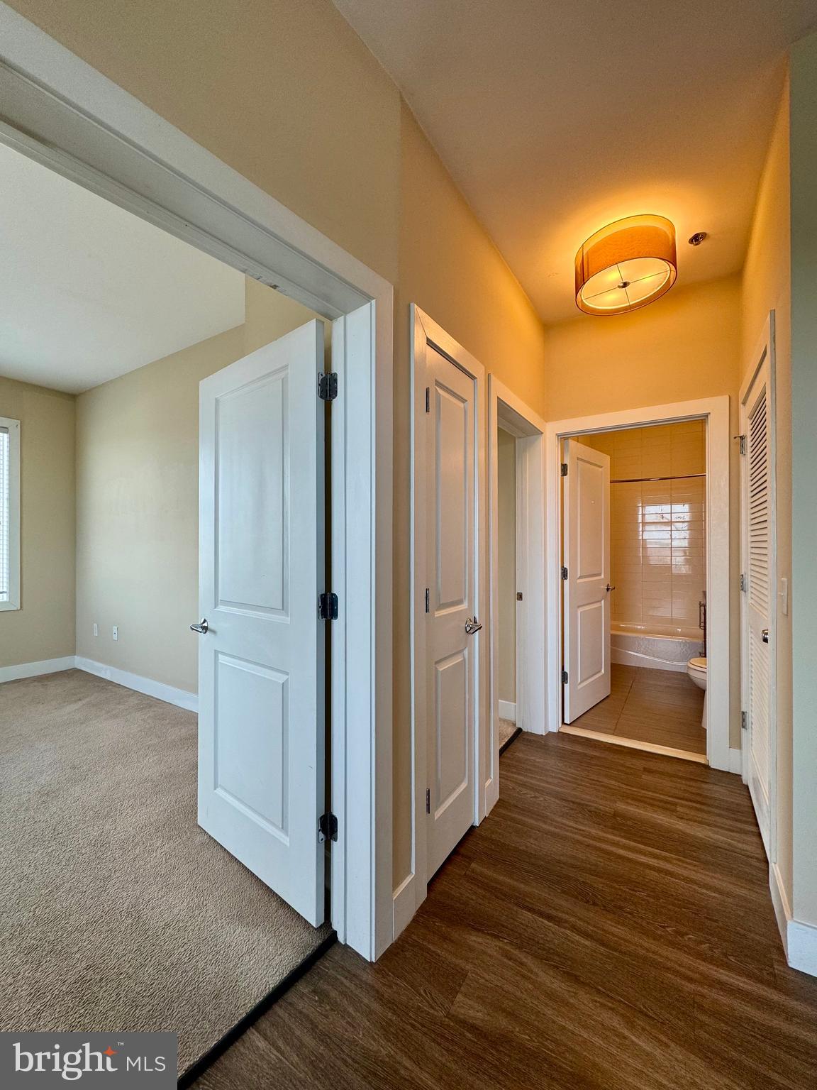 1201 South Charles Street, Unit 5A Baltimore, MD 21230 - Photo 8 of 15 a view of a hallway with wooden floor