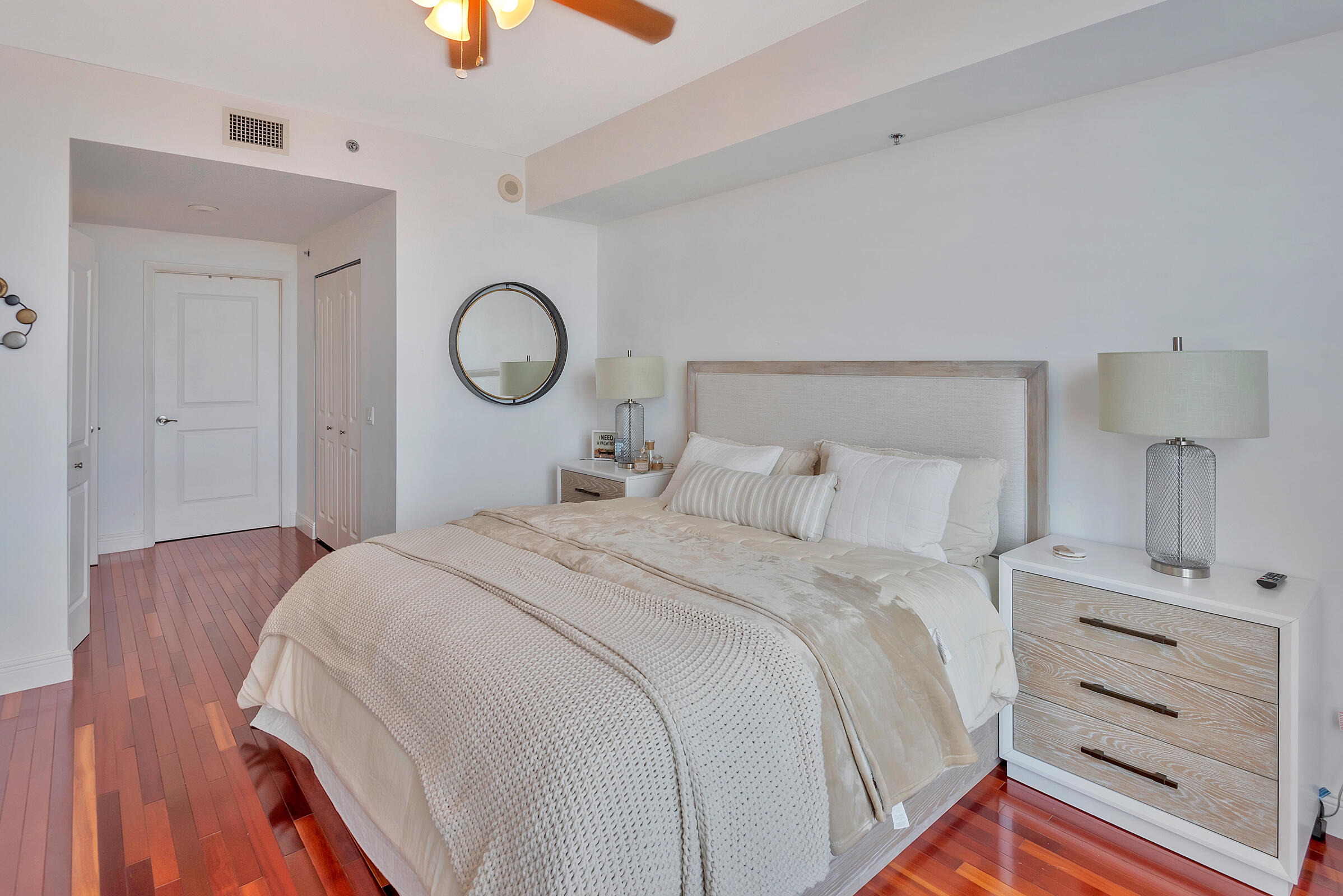 2641 North Flamingo Road, Unit 2503N Sunrise, FL 33323 - Photo 16 of 47 a bedroom with a bed and a chandelier