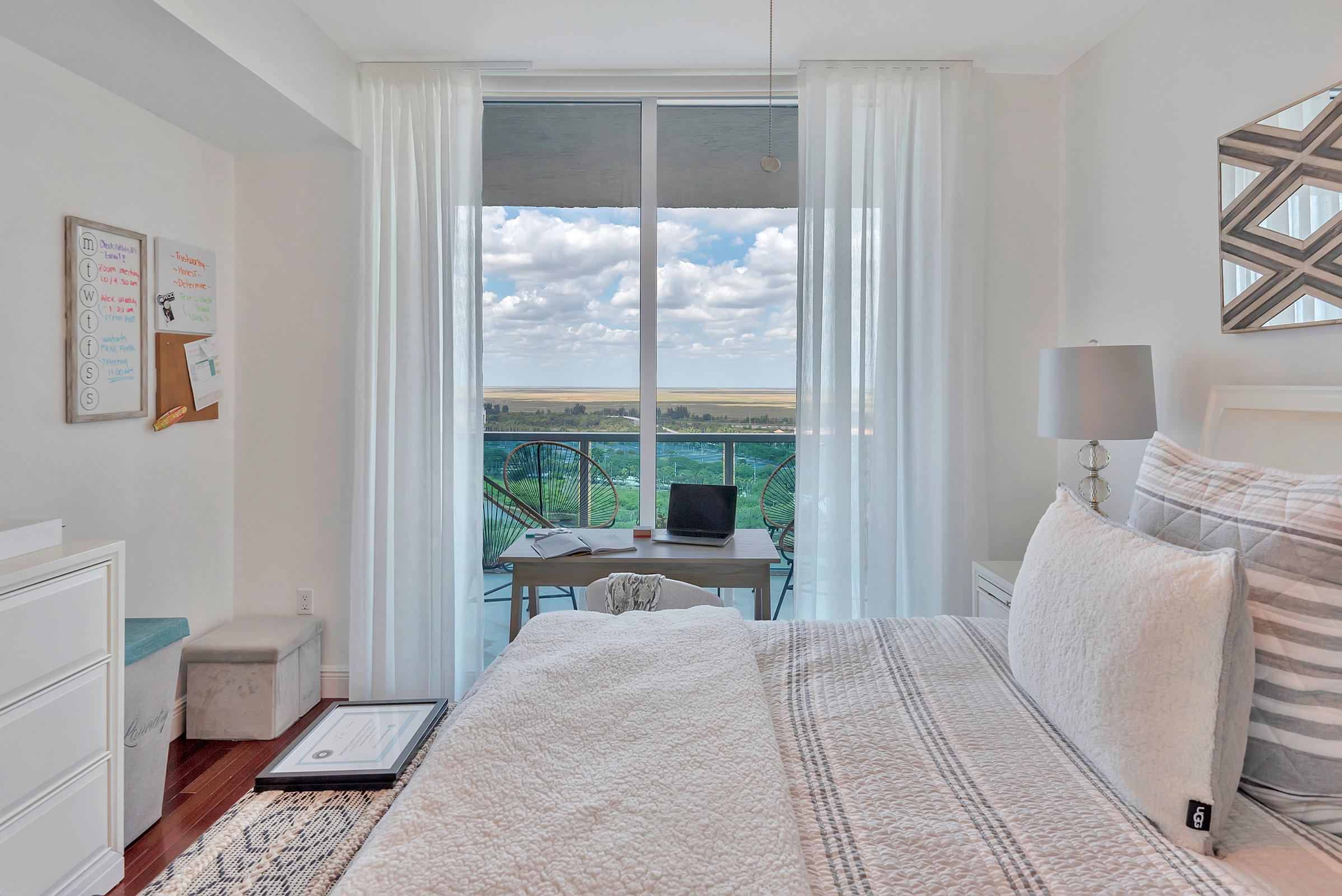 2641 North Flamingo Road, Unit 2503N Sunrise, FL 33323 - Photo 19 of 47 a bedroom with furniture and a large window