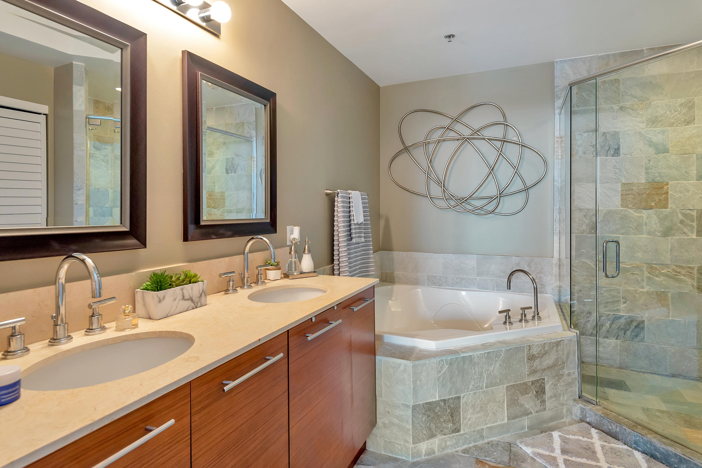 2641 North Flamingo Road, Unit 2503N Sunrise, FL 33323 - Photo 22 of 47 a bathroom with a sink and a mirror