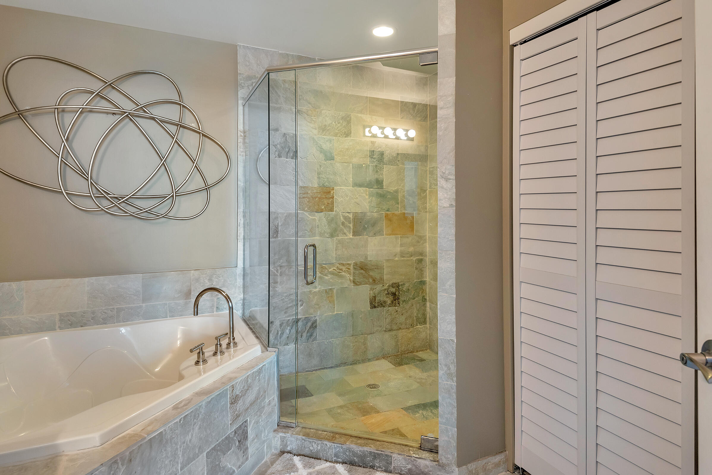 2641 North Flamingo Road, Unit 2503N Sunrise, FL 33323 - Photo 23 of 47 a bathroom with a bathtub and a shower