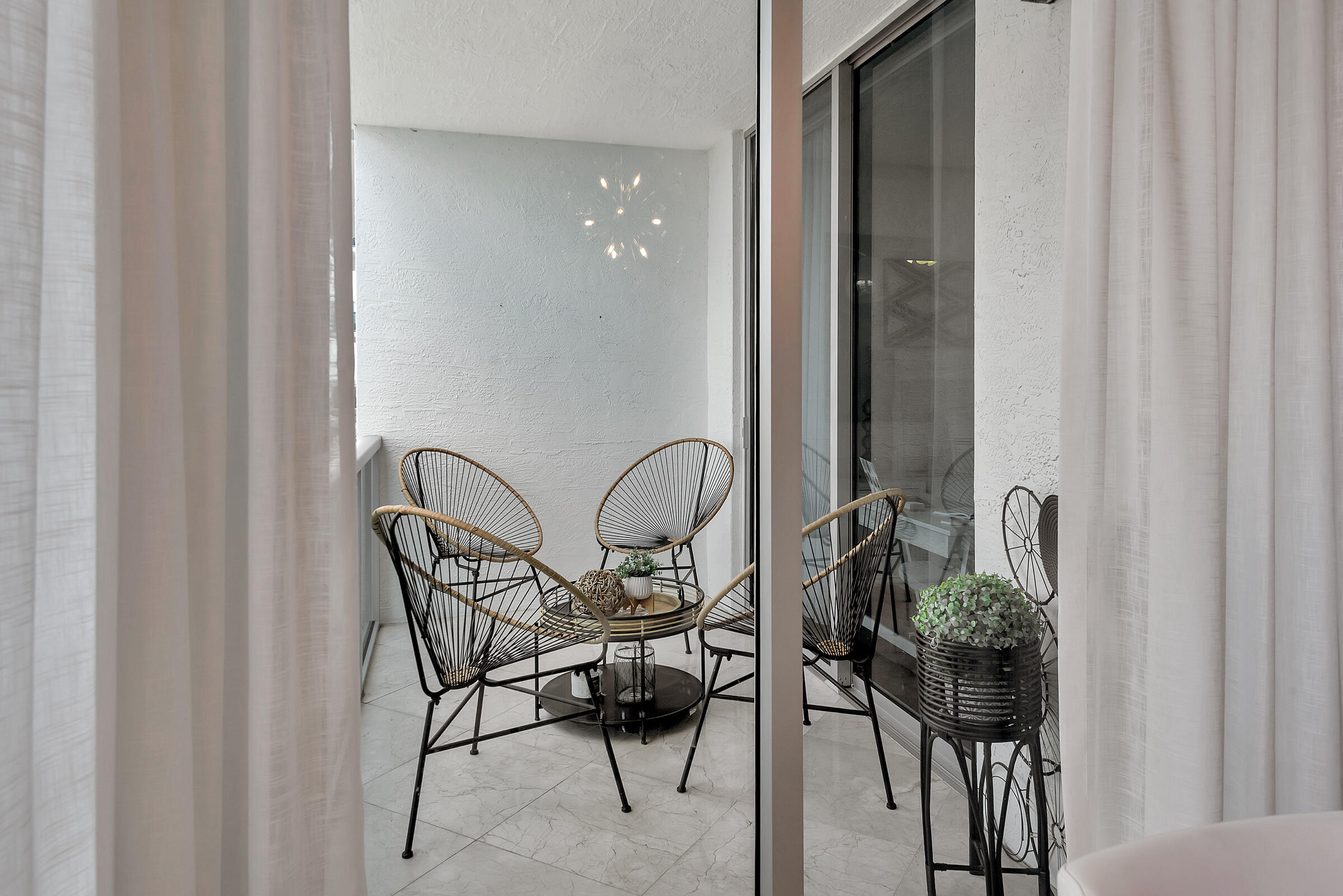 2641 North Flamingo Road, Unit 2503N Sunrise, FL 33323 - Photo 27 of 47 a view of a dining room with furniture and wooden floor