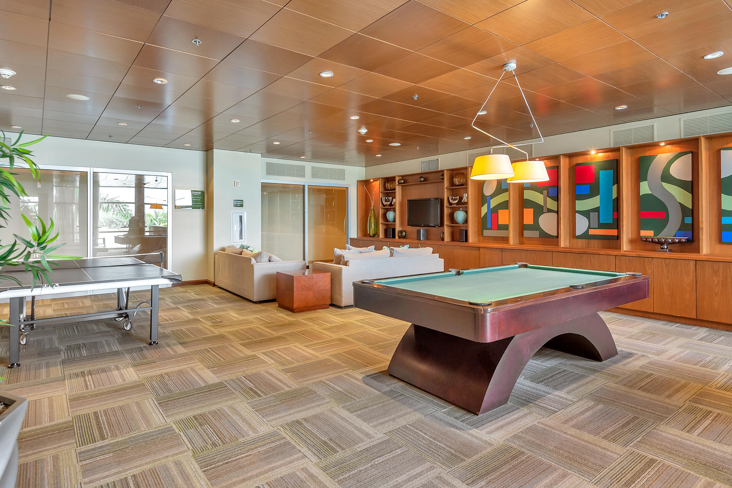 2641 North Flamingo Road, Unit 2503N Sunrise, FL 33323 - Photo 38 of 47 a room with lots of tables and chairs