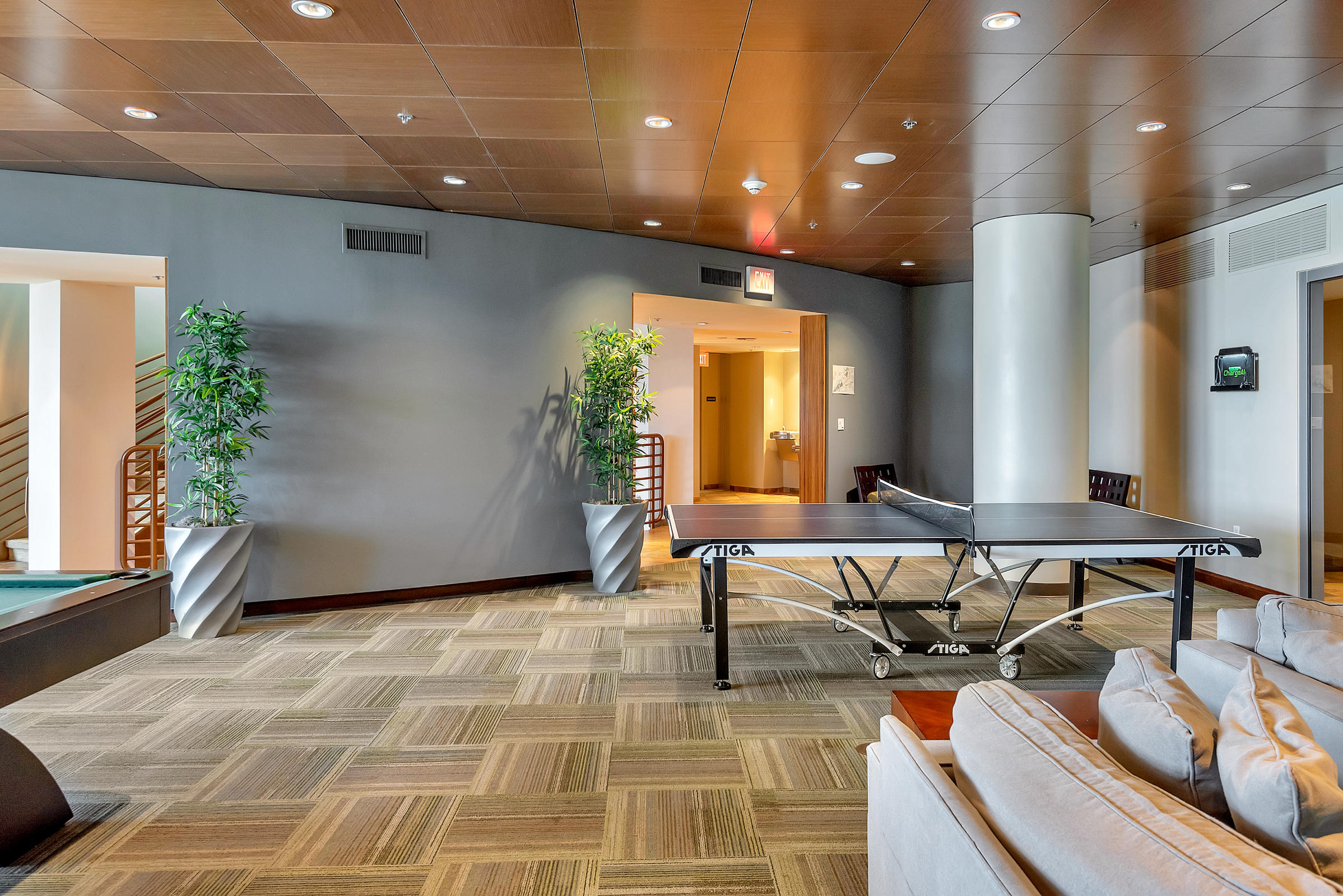 2641 North Flamingo Road, Unit 2503N Sunrise, FL 33323 - Photo 40 of 47 a living room with furniture and a potted plant