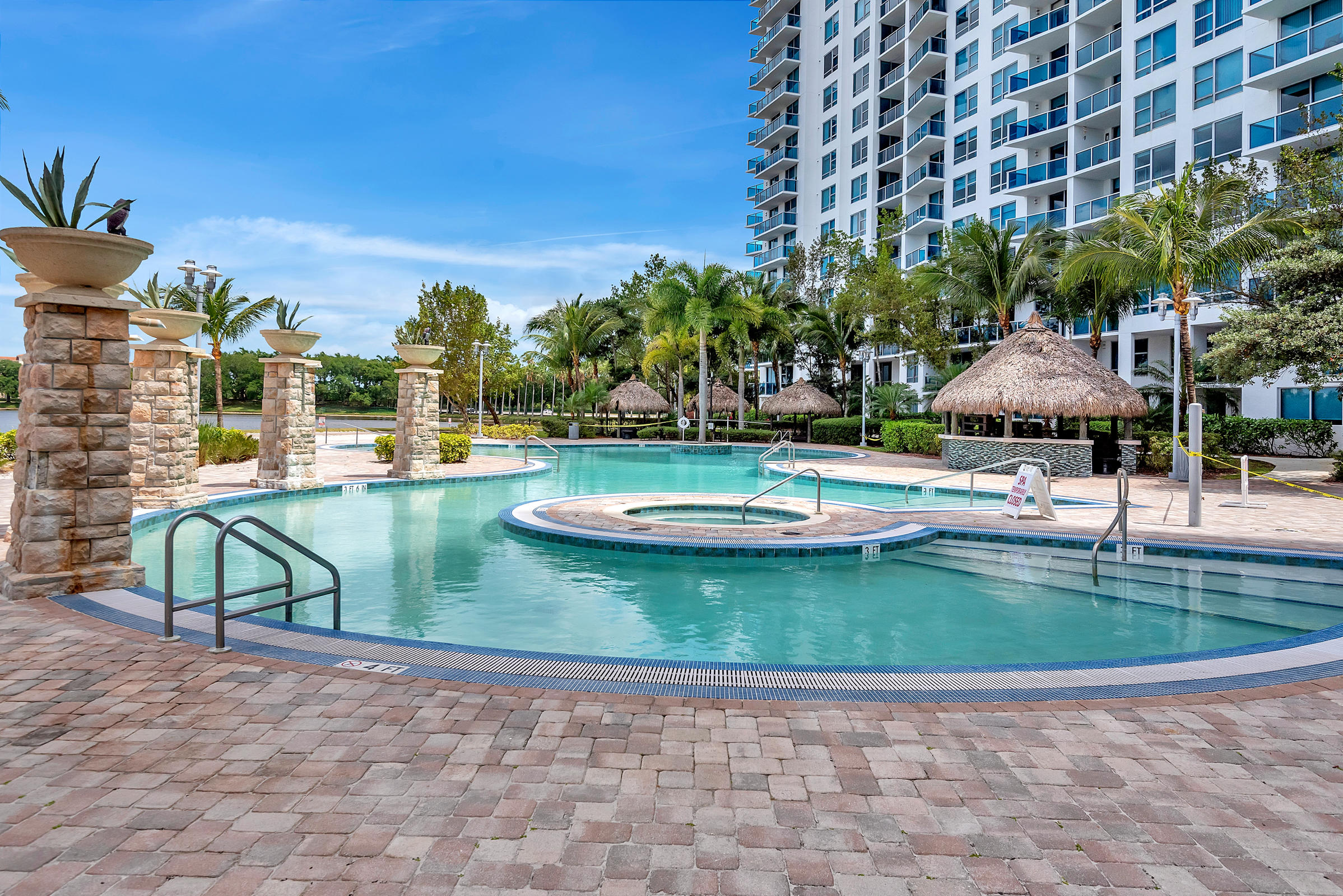 2641 North Flamingo Road, Unit 2503N Sunrise, FL 33323 - Photo 45 of 47 a view of a swimming pool with a patio