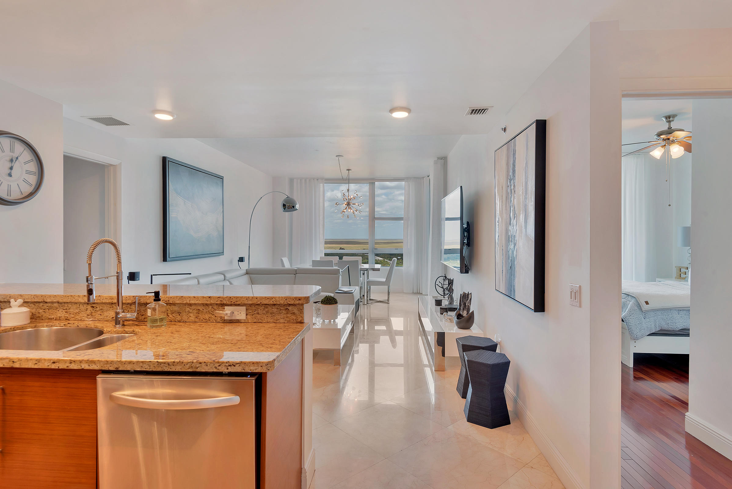 2641 North Flamingo Road, Unit 2503N Sunrise, FL 33323 - Photo 9 of 47 a kitchen with a refrigerator and a sink