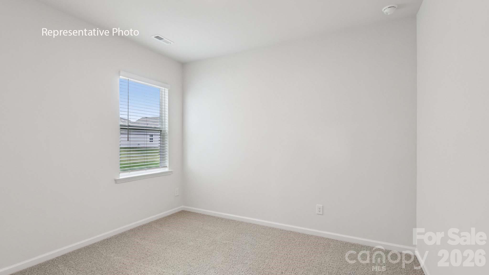 7608 Bainbridge Road Sherrills Ford, NC 28673 - Photo 20 of 28 a view of an empty room with a window