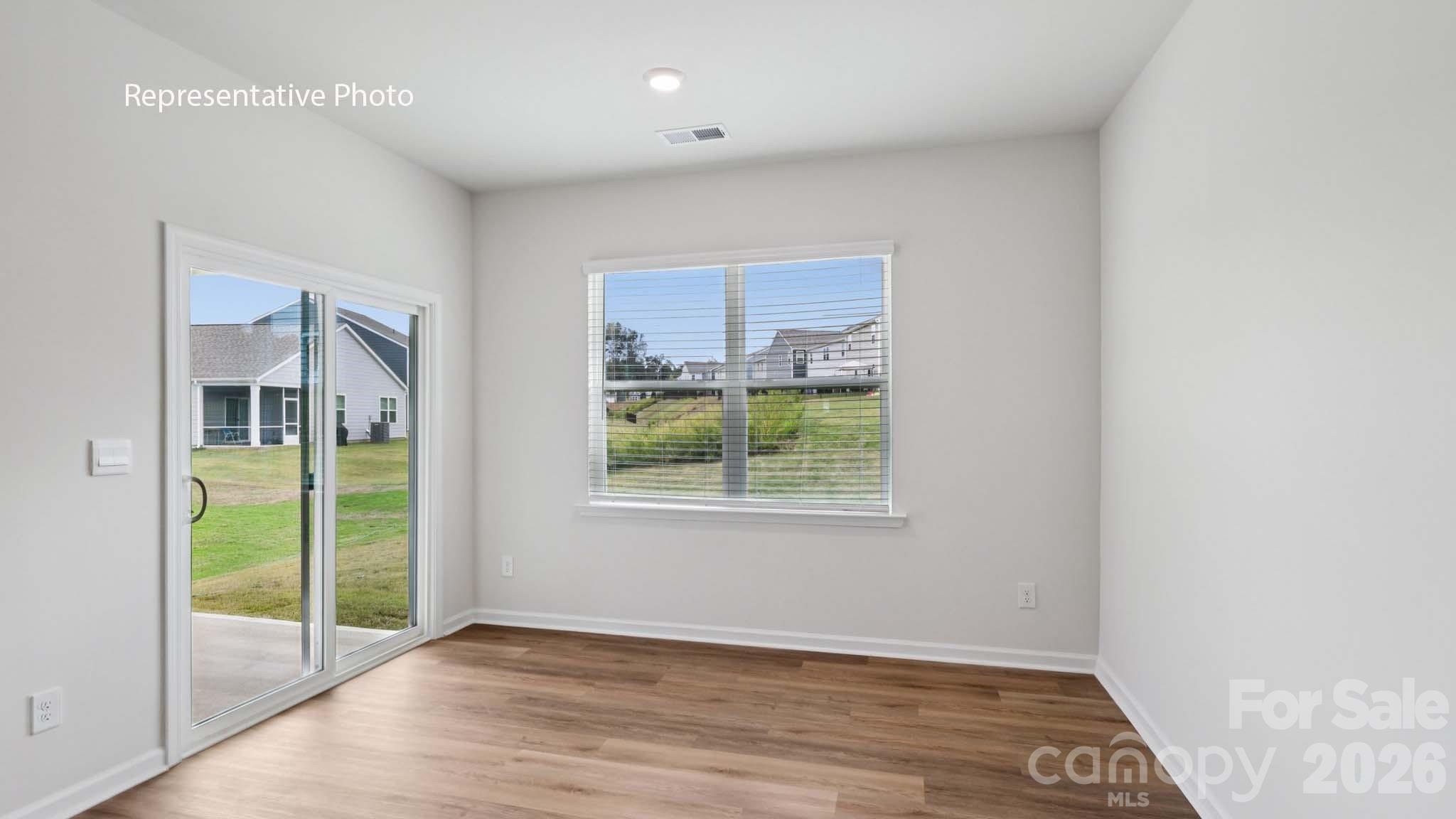 7608 Bainbridge Road Sherrills Ford, NC 28673 - Photo 24 of 28 an empty room with windows