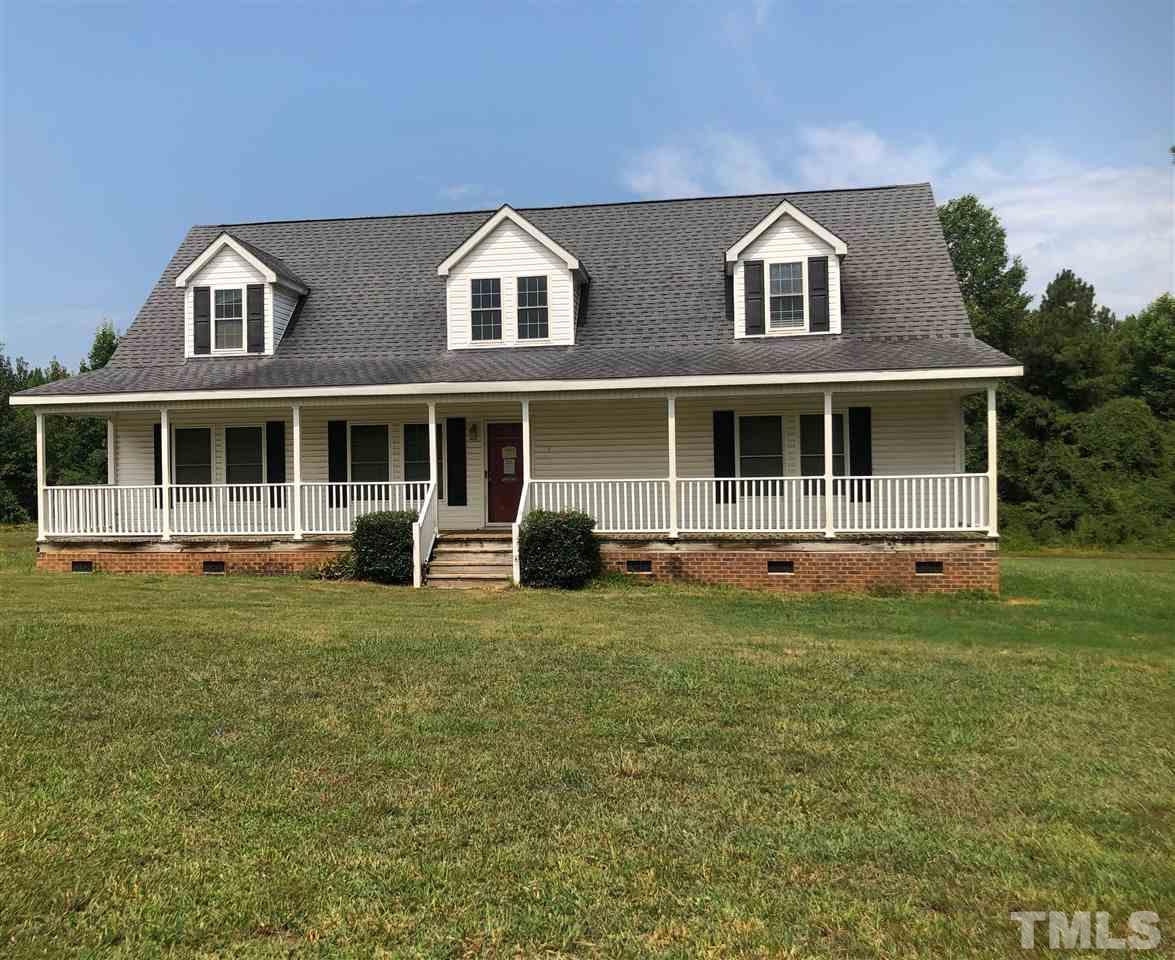 330-j B J B Leonard Road Castalia, NC 27816 - Photo 2 of 9 a front view of a house with a garden