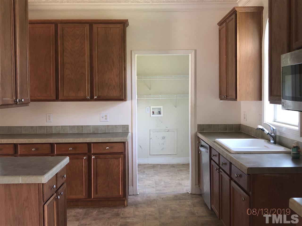 330-j B J B Leonard Road Castalia, NC 27816 - Photo 5 of 9 a kitchen with a sink stove and cabinets