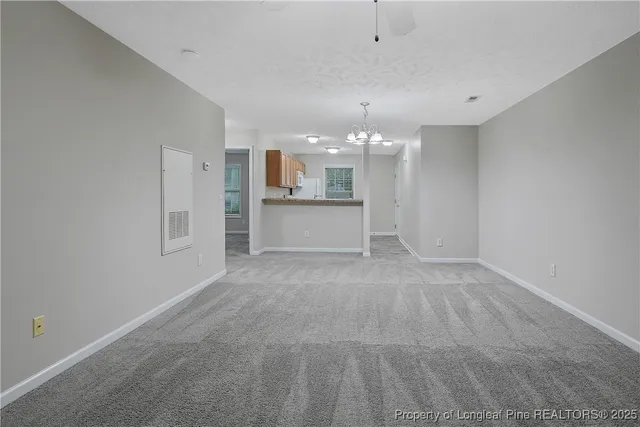 a view of a livingroom with a furniture