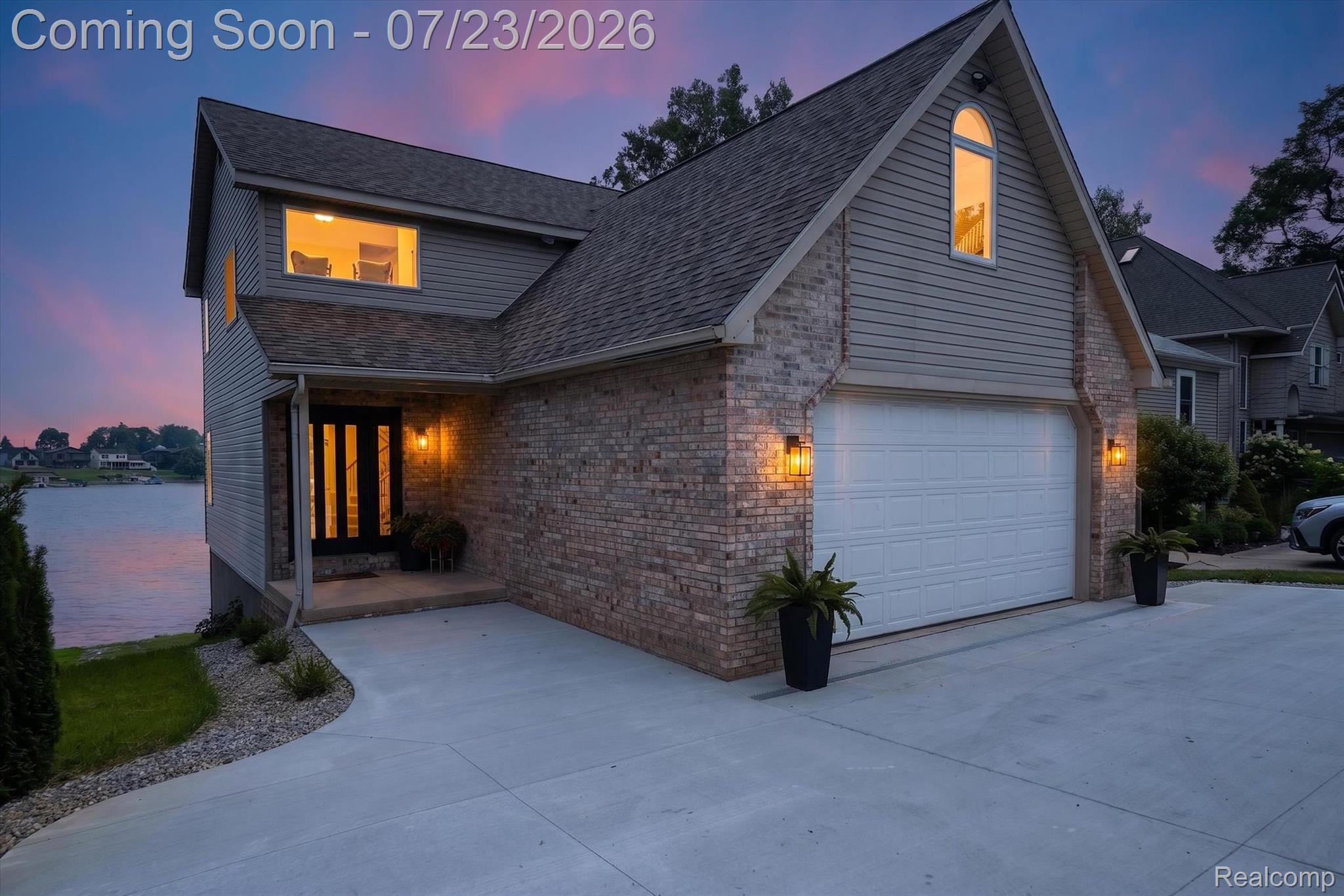 3429 Rolston Road Fenton, MI 48430 - Photo 1 of 62 Two-story residence featuring a brick and siding exterior with a prominent waterfront position