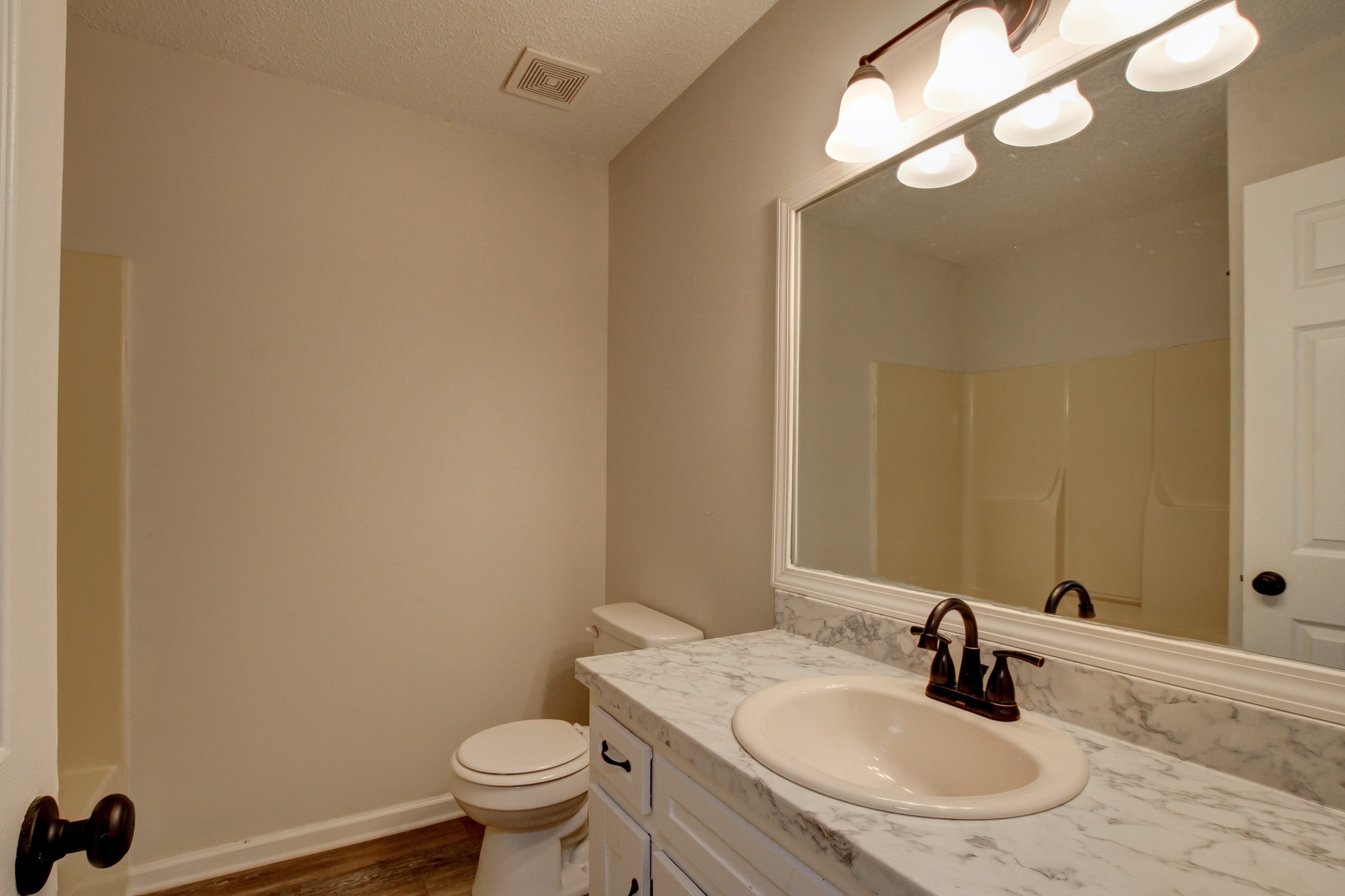 1007 McClardy Road Clarksville, TN 37042 - Photo 20 of 34 a bathroom with a sink and a mirror