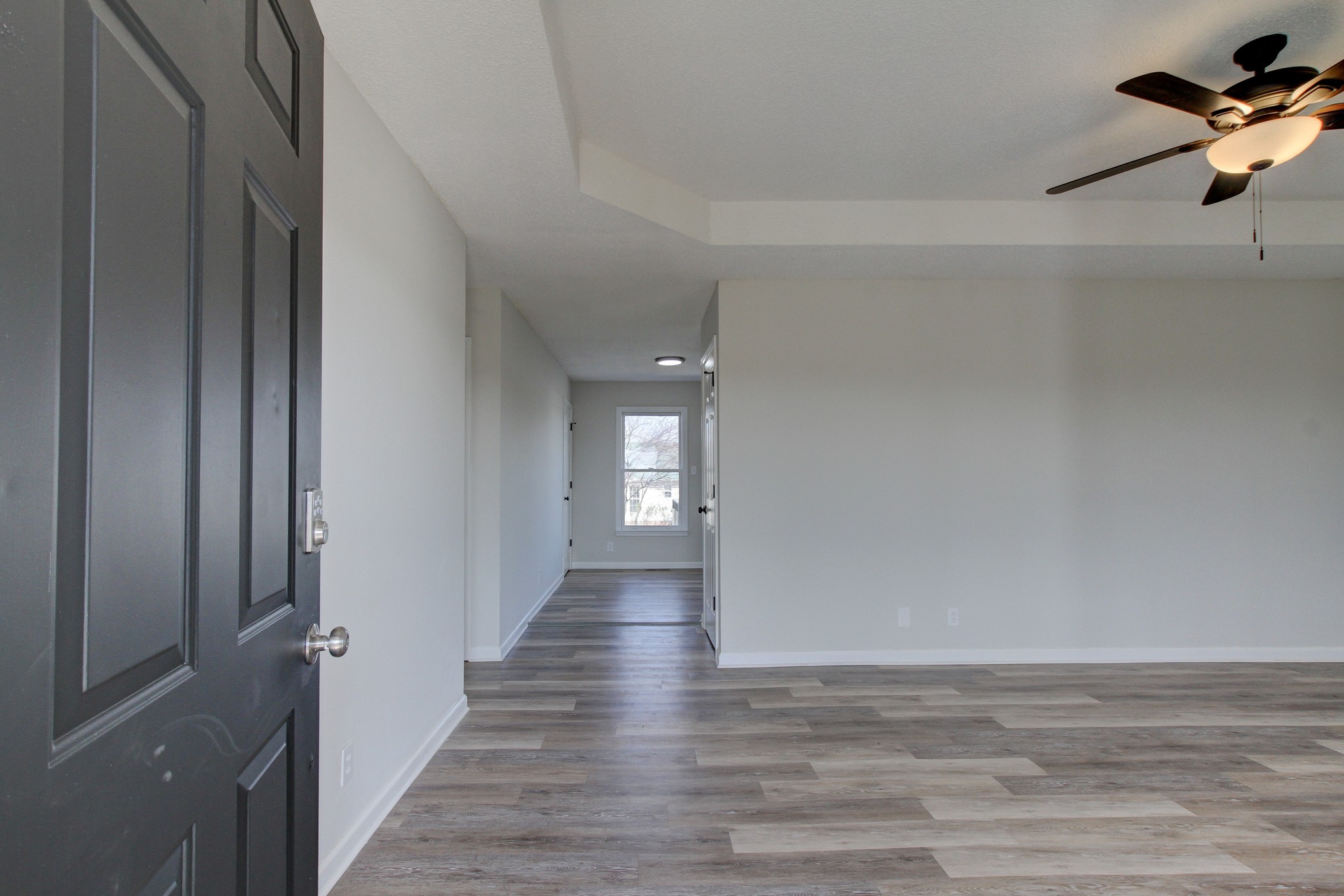 1007 McClardy Road Clarksville, TN 37042 - Photo 4 of 34 a view of a livingroom with wooden floor