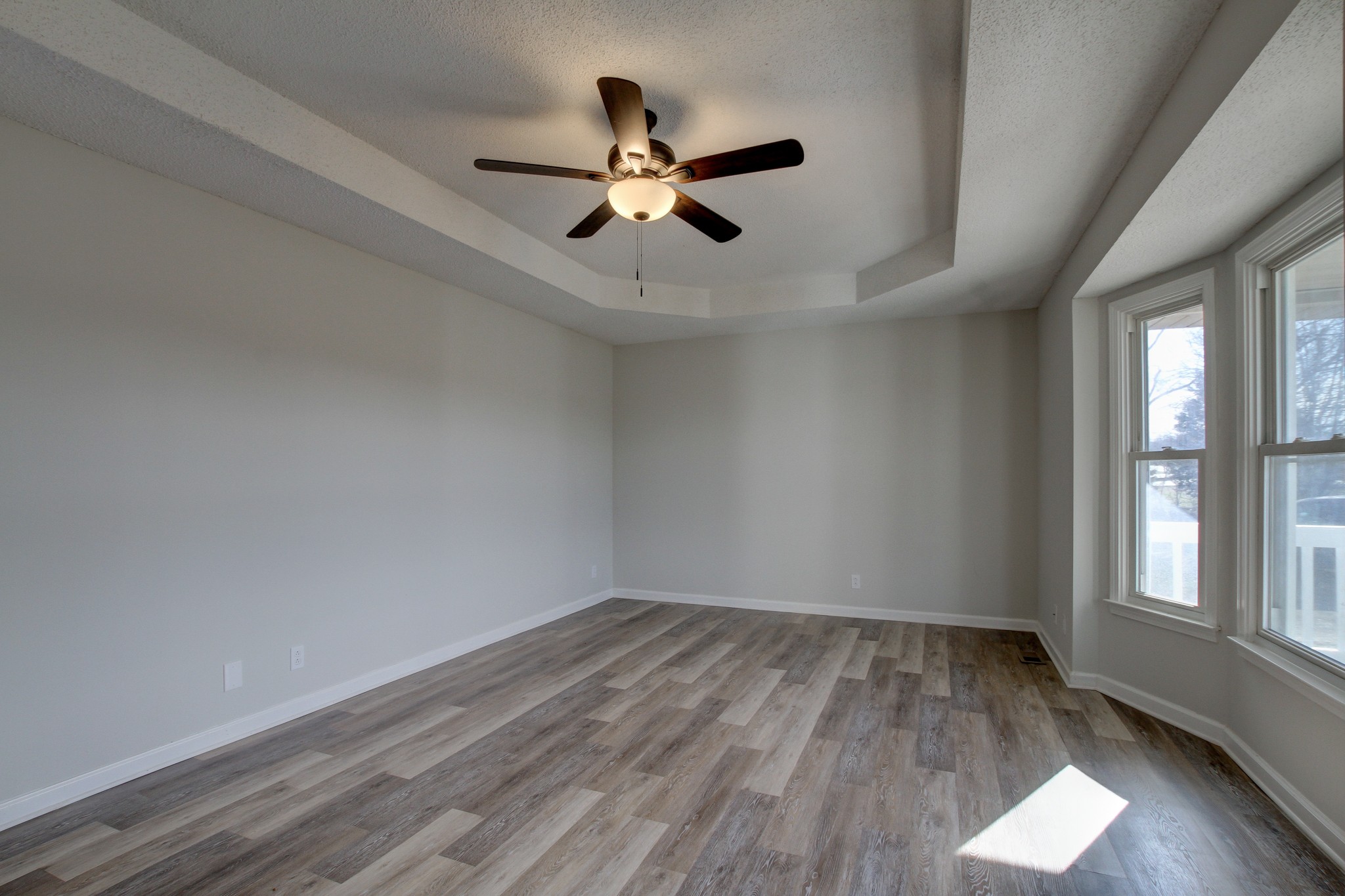 1007 McClardy Road Clarksville, TN 37042 - Photo 5 of 34 wooden floor in an empty room with a window