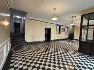 a view of an empty room with stairs